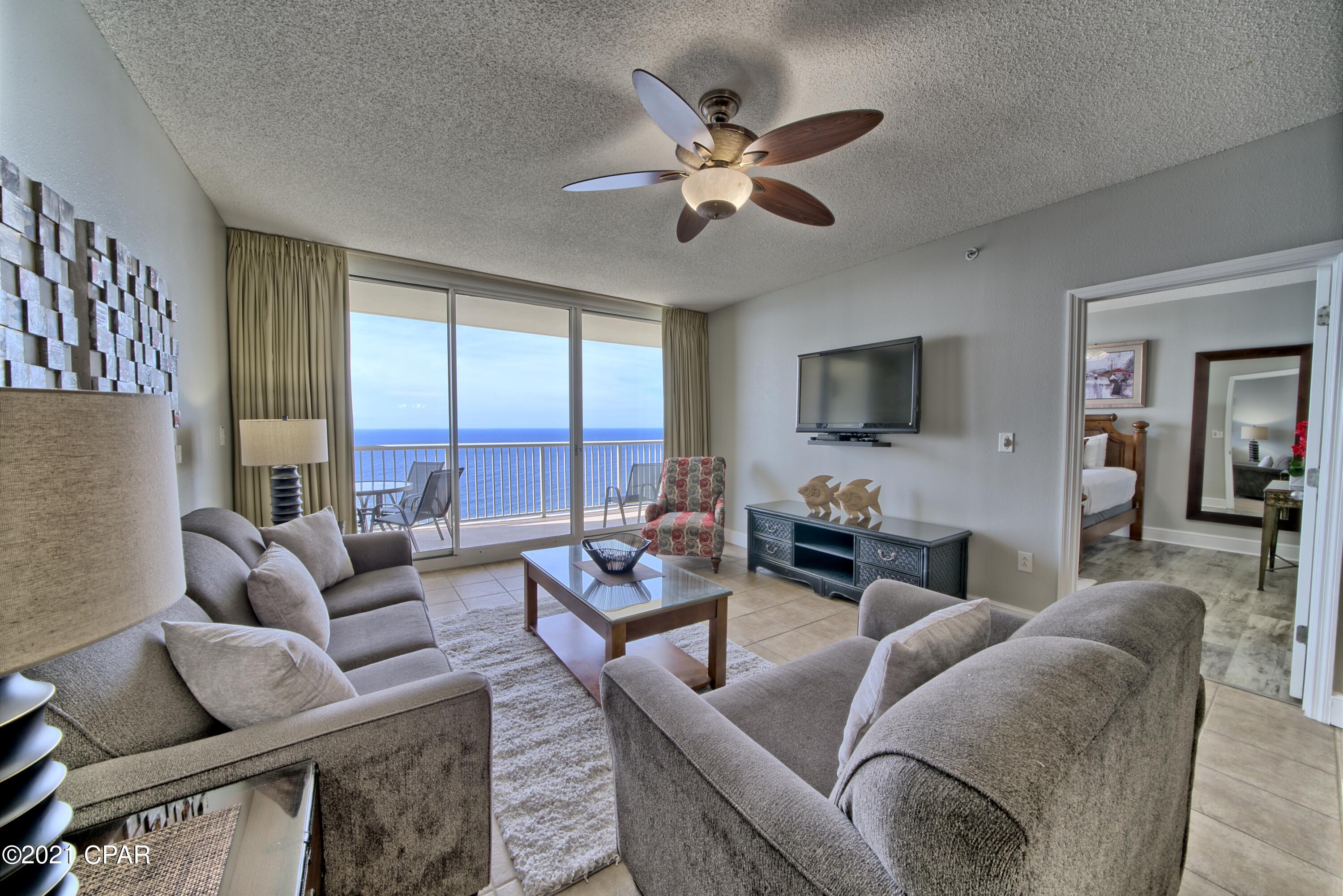**ABSOLUTELY STUNNING** This 3 bed 3 bath w/bunk room condo which boasts almost 1600 sq. ft. of SUPERB GULF FRONT LIVING is being SOLD FULLY FURNISHED & RENTAL READY!. This FANTASTIC floor plan has a LARGE oversized BALCONY, GULF FRONT MASTER SUITE with a double sink vanity, separate walk-in shower & Jacuzzi tub, walk-in closet, tile throughout the main living area, vinyl plank flooring in the bedrooms. The gourmet kitchen has S/S appliances, solid surface counter tops and a large breakfast bar. MAJESTIC BEACH RESORT is one of PCB's finest communities with unsurpassed amenities which include 3 LARGE outdoor pools, 2 HEATED INDOOR POOLS, fitness facility, movie theater, tennis court, Starbucks Deli and the H2O poolside bar & grill. Don't let this ONCE in a LIFETIME OPPORTUNITY pass you by!!