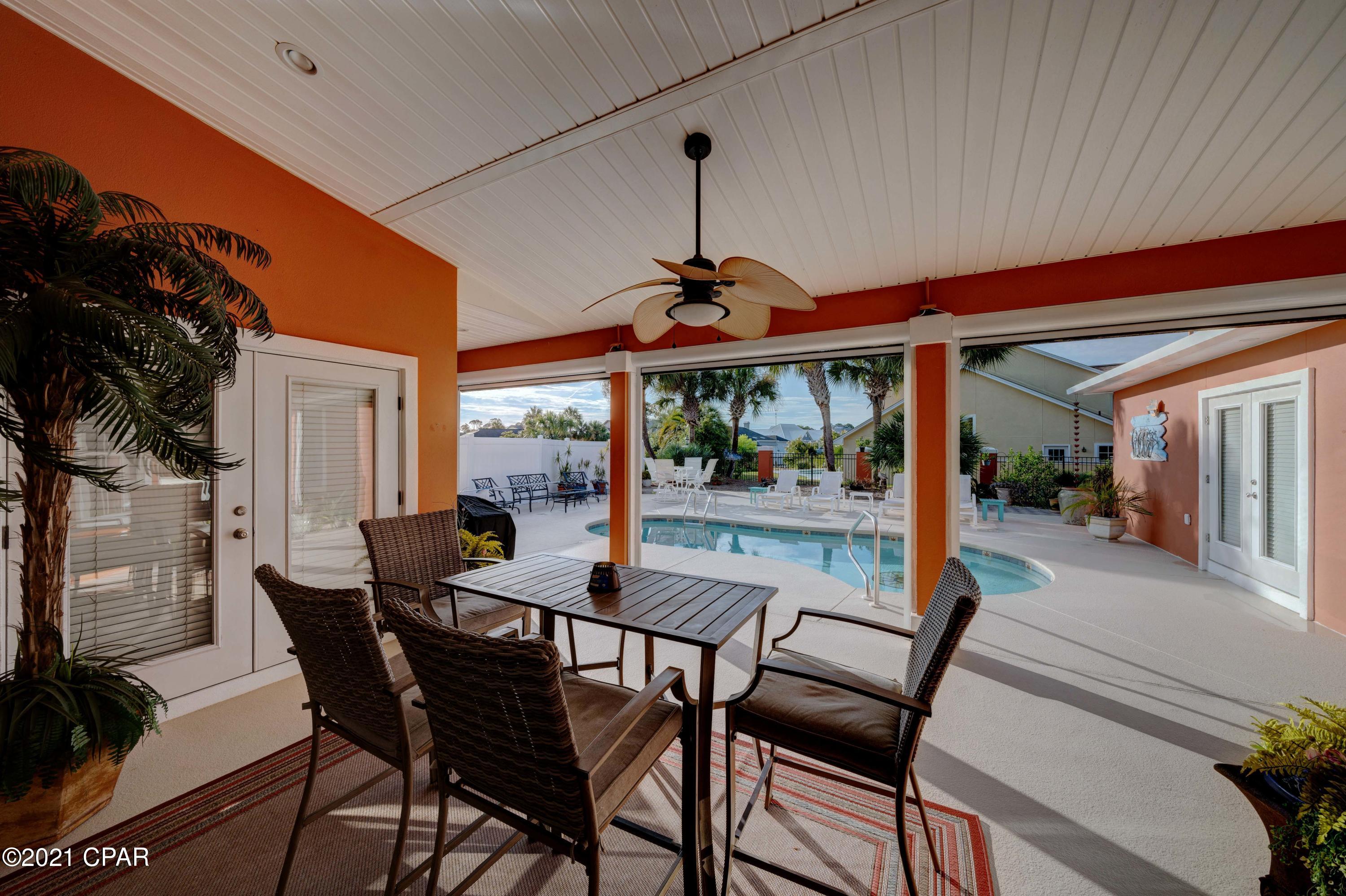 CURRENTLY UNDER CONTRACT, SELLER ACCEPTING BACKUP OFFERS. This gorgeous home in Bay Point checks all the boxes - just like new and sold fully furnished! 4 bedrooms and 3.5 baths, including 2 master suites, all on one level for convenient living for families and all ages.  This well maintained second home is perfect and ready for you - just bring your toothbrush clothes and move to Panama City Beach!  Enjoy a newly updated kitchen, beautiful furnishings, and the perfect open layout for easy beach living. Step outside to an  incredible covered porch with electric screens (turn porch into a screen porch with a click)  and a pool! Bay Point is a gated community with golf, tennis, restaurants, marina under construction and set to open soon and only minutes to the beach! Call us today and make
