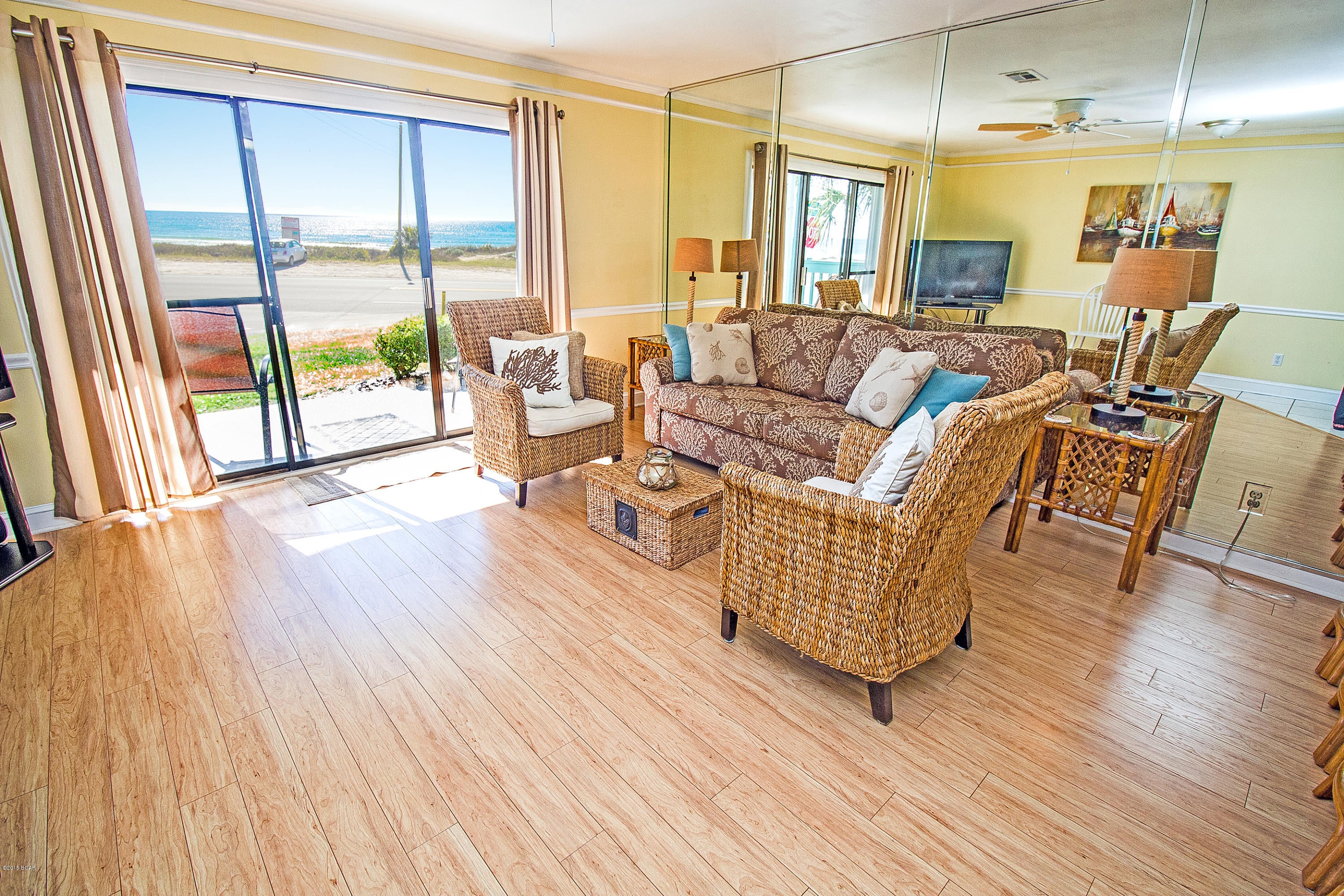 YOUR VERY OWN DEDICATED BEACH!!! **Home comes furnished as seen at showing!!!** THIS IS A GREAT INVESTMENT!!! This 1-story FIRST FLOOR condo with breath-taking and unobstructed views of the gulf comes furnished with dedicated Laguna Beach access! Bunk beds in the hallway, and unit sleeps 6 people! This is a hard unit to come across on today's market! No elevator to deal with or busy crowds!!! The home has been updated and is *rental ready!* There is also a community pool and BBQ Pit area. It's a 1BR/1.5BA unit at the West End of the beach located right next to the Carousel Supermarket making grocery shopping a breeze. This unit is in a great location with tons of convenience. This home also has wide open gulf views! **The beach in front of this unit is protected and can never be built on!* Age, Square Footage, and room sizes are approx, if important please verify.