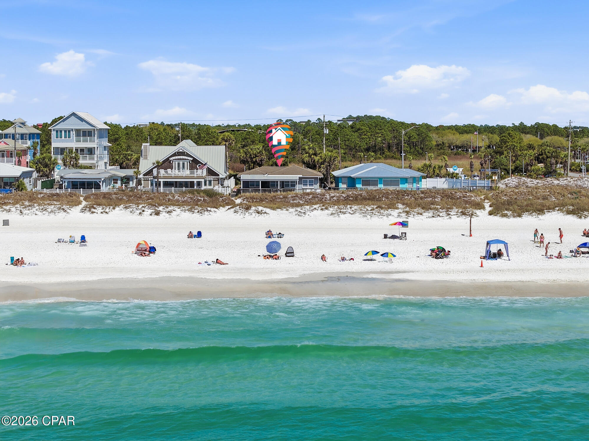 The most prime location! Beachfront cottage located at the Pier Park beach on a 50 foot lot! The views are breathtaking! The back porch offers a covered section and an open section for sun tanning! There is a large living room with plenty of seating! There are 4 bedrooms and 3 bathrooms in total on the property. The main cottage has 3 bedrooms and two bathrooms. One of the bedrooms is an efficiency with its own kitchenette. There is also a carriage building with a private bedroom and bathroom under the carport. There is a pathway directly to the beach between the sand dunes. Walk to Pier Park and the many restaurants, shopping and activities this area has to offer. Enjoy fireworks from the back porch many times of the year. Walk to concerts and events at Aaron Bessant Park. The dog beach is also just steps away. Don't miss this amazing opportunity to own your own piece of paradise!