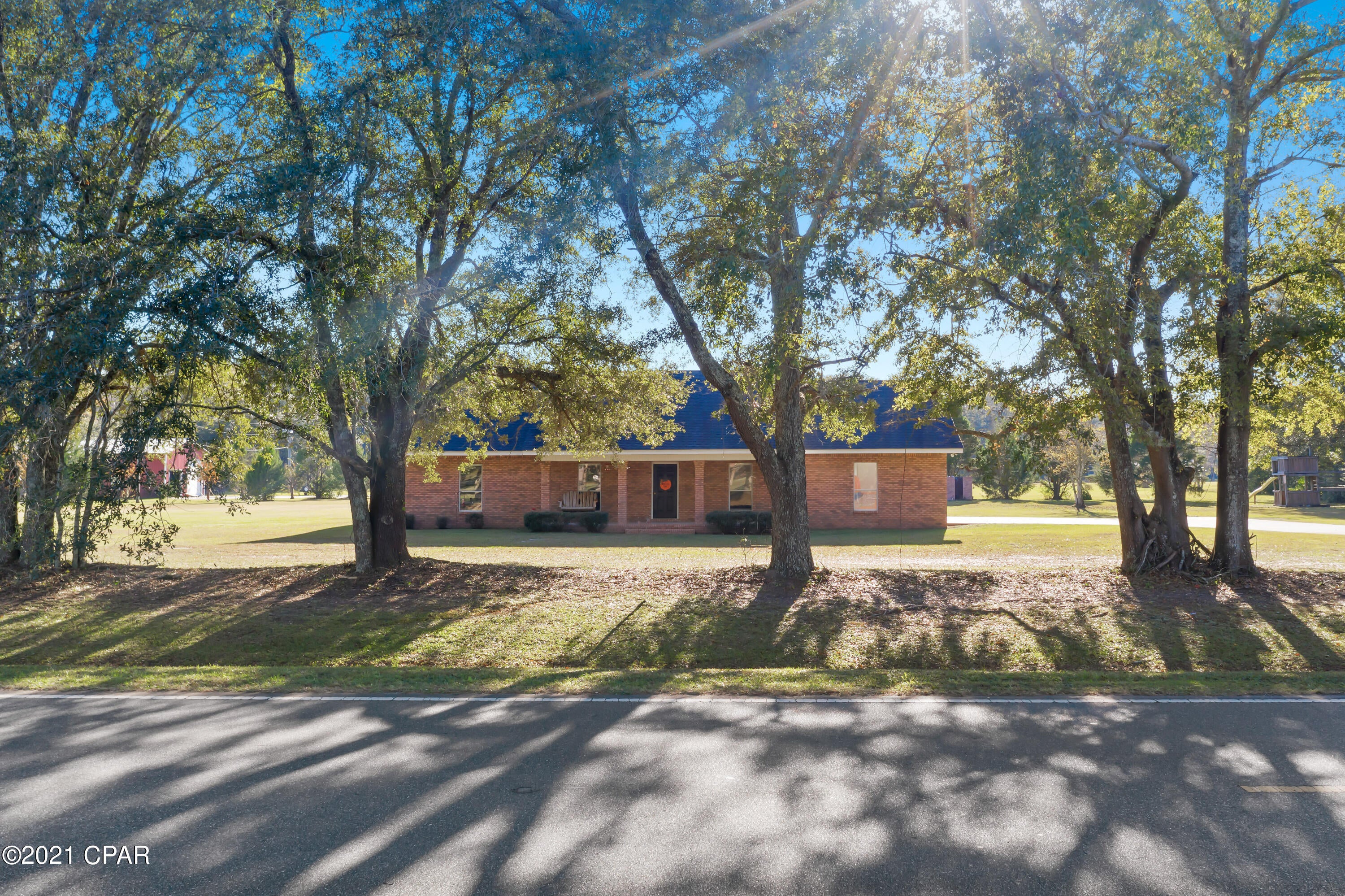 Great brick beauty situated on 1.5 acres and located on a paved road.  The living area of the home is an open concept- with the large living area open to the kitchen.  The kitchen is a chef's dream an features a large breakfast bar and plenty of cabinets.  The master bedroom is oversized and has a large walk in closet.  Outside the home is a 24x48 workshop that has water and electricity, in addition to a 24x15 lean to.  This is a must see!