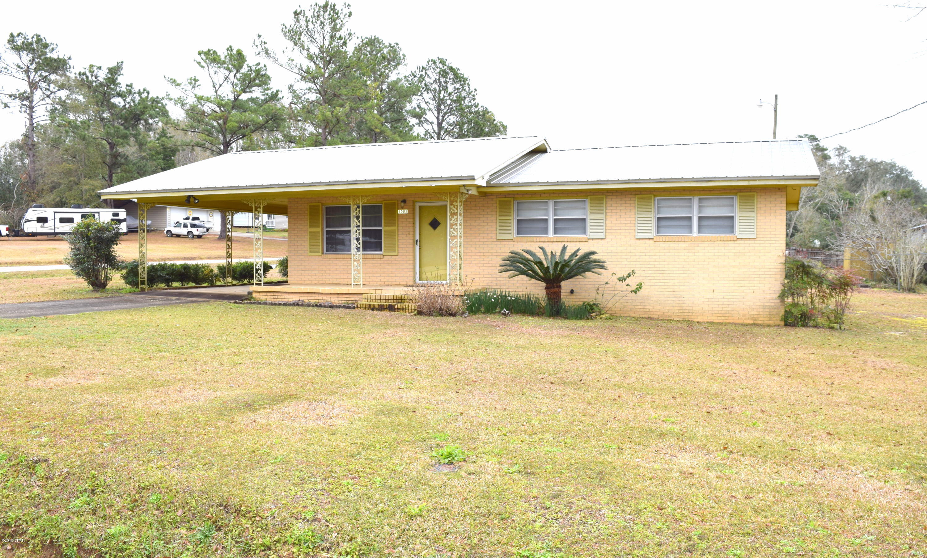 Come see this charming 3 bedroom, 2 bath home featuring an open living, dining and kitchen, master bedroom with attached bathroom, oversized laundry room and attached carport. Home is situated on a corner lot in the heart of Bonifay, a short drive to schools, shopping and I-10.