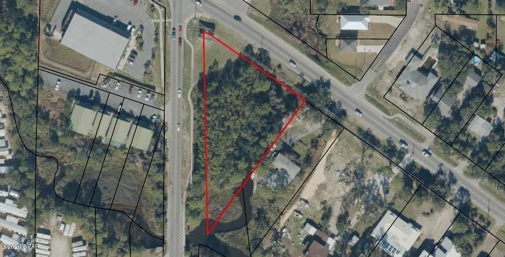 PRIME COMMERCIAL CORNER  OF JOAN AND NORTH LAGOON DRIVE.   Frontage on Joan and North Lagoon Dr.   Billboard sign on property will convey with sale of property.  General Commercial  C-3 zoning . See baycountyfl.gov chapter 6 for allowable uses.  Property located in beaches special area treatment zone.   Close proximity to tourist attractions, amusements, boat / jet ski rentals,  Signal Hill golf course, Marinas, fine dining,bars,  shopping, Navy  Base, resorts, vacation rentals , fishing and ..charter boats,,boat storage and slip rentals. and the  beautiful beaches  of Thomas Drive .,  Over 100 feet of waterfront on Grand Lagoon with scenic estuary and a small canal on the East boundary separating the lot from the residential area on North Lagoon Drive.  

.Good traffic flow year round with  excellant exposure to heavy tourist traffic. Corner location at four way stop with traffic light. 370 +/- feet of frontage on Joan and North Lagoon Dr. 103+/- feet waterfront on Grand Lagoon.  Small canal on East boundary,