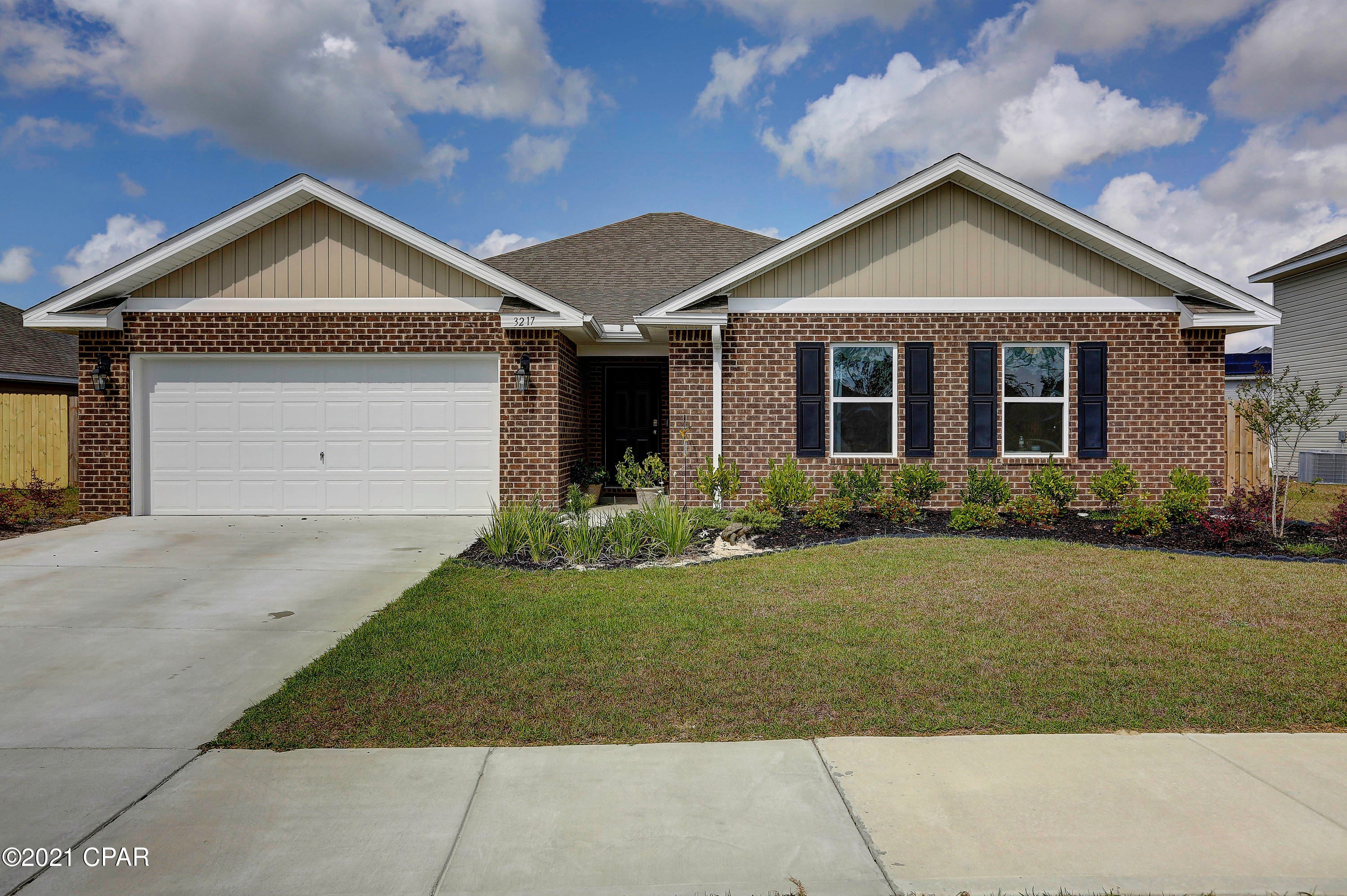 The very popular Denton Plan with 4 bedrooms and 2 baths.   Beautiful vinyl flooring throughout the home. Wide hallways with a very open concept living, kitchen and dining room. As you enter this home through the foyer you will find a large hallway that leads to three bedrooms with a shared bathroom and spacious  laundry room. The kitchen is open and looks out to the living room and includes appliances: refrigerator, stove, microwave and dishwasher. A dining space leads out to the covered back porch with fenced backyard. The master suite is large with a walk-in closet. This home has Smart Home Technology, allowing you to control the AC, lighting and even secure your home from a single touch panel.