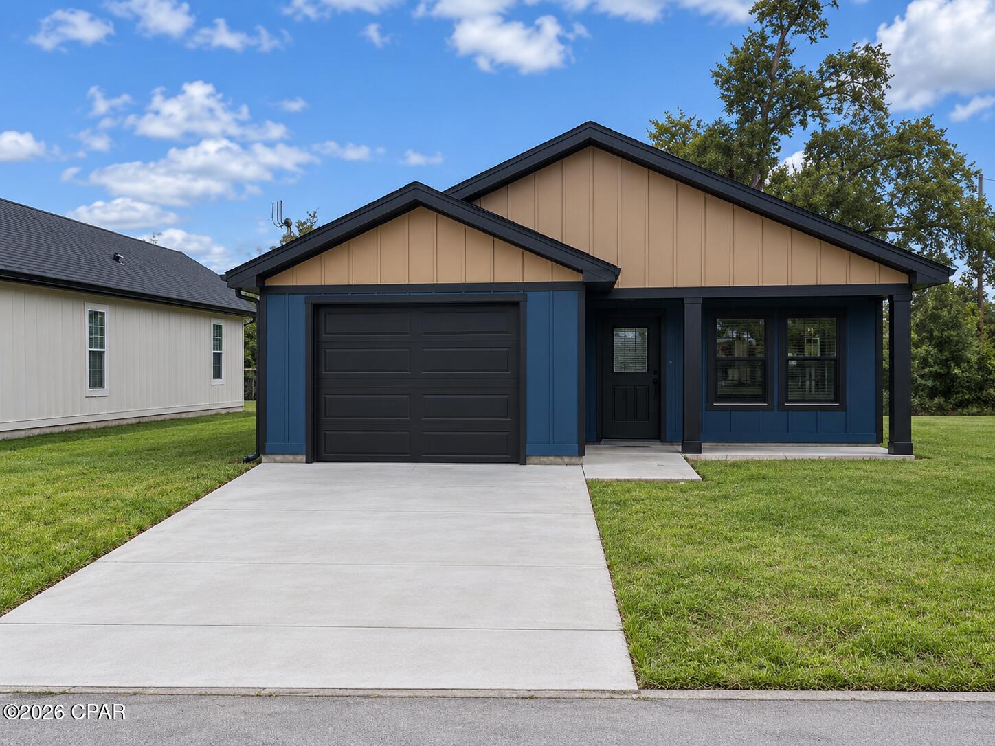 NEW CONSTRUCTION -- NEARING COMPLETION! Approximately 300 feet from a boat ramp, this 3-bedroom, 2-bath home with an attached garage and concrete driveway combines convenient water access with a central Panama City location near hospital services, grocery stores, shopping, and dining.

Built with attention to the details that matter, the home features 2x6 exterior wall framing, durable Hardie fiber-cement siding, and luxury vinyl plank flooring. Plywood cabinetry with soft-close features, quartz countertops, and thoughtfully selected fixtures bring style and quality throughout. The primary bathroom features a shower and double-sink vanity, while the second bathroom includes a bathtub.

Enjoy the appeal of a brand-new home with quality materials, modern finishes, and everyday convenience in the heart of Panama City. Estimated completion is approximately 30 days, subject to final inspections and issuance of the certificate of occupancy. Schedule a showing to see the craftsmanship and finishing details firsthand!