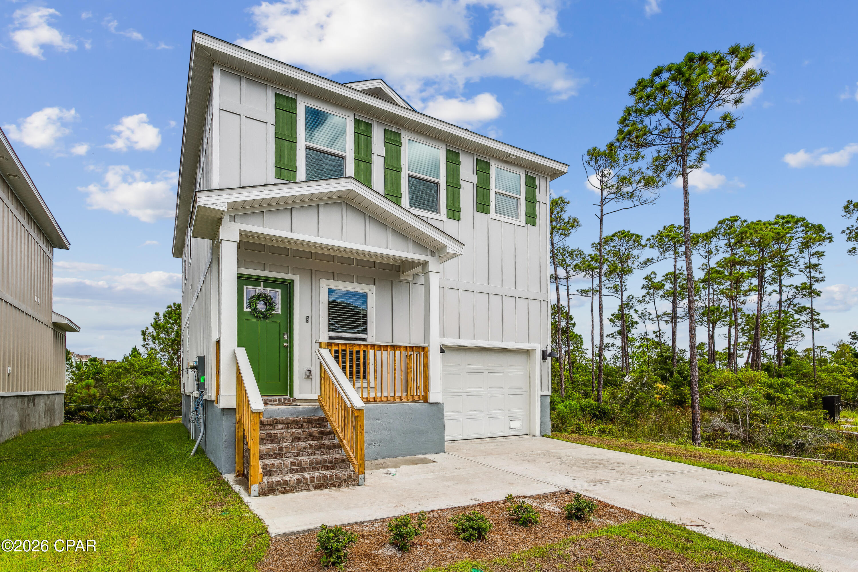 Fully furnished and move-in ready, this perfectly maintained coastal home is located in the desirable Serenity community, just minutes from the white-sand beaches of Perdido Key. Tucked away on a quiet cul-de-sac and designed with Short-Term Rental potential in mind, this property offers an ideal combination of relaxed Gulf Coast living and strong investment appeal. This two-story 3BD/2.5BA home with a one-car garage offers 1,741 sq ft of comfortable living space.

The main level features a bright open-concept layout that seamlessly connects the family room, dining area, and kitchen--perfect for everyday living or entertaining guests. The kitchen is well appointed with granite countertops, stainless steel appliances, ample cabinetry, a large island bar, and a pantry.

Upstairs, the spacious primary suite serves as a private retreat with an en-suite bath featuring double granite vanities, a garden soaking tub, a separate walk-in shower, and a generous walk-in closet. Two additional bedrooms, a second full bath, and a conveniently located laundry room equipped with a washer and dryer complete the upper level.

Sold fully furnished-including TVs, decor, kitchenware, linens, and essentials--this home is truly turnkey and ready for immediate enjoyment or rental income. Residents and guests will appreciate the close proximity to River Road dog park and beach access, boat and kayak launches, golf courses, parks, military bases, and many popular restaurants, shopping, and entertainment options. This property offers the perfect blend of comfort, convenience, and coastal lifestyle. Call now for your private and exclusive showing!