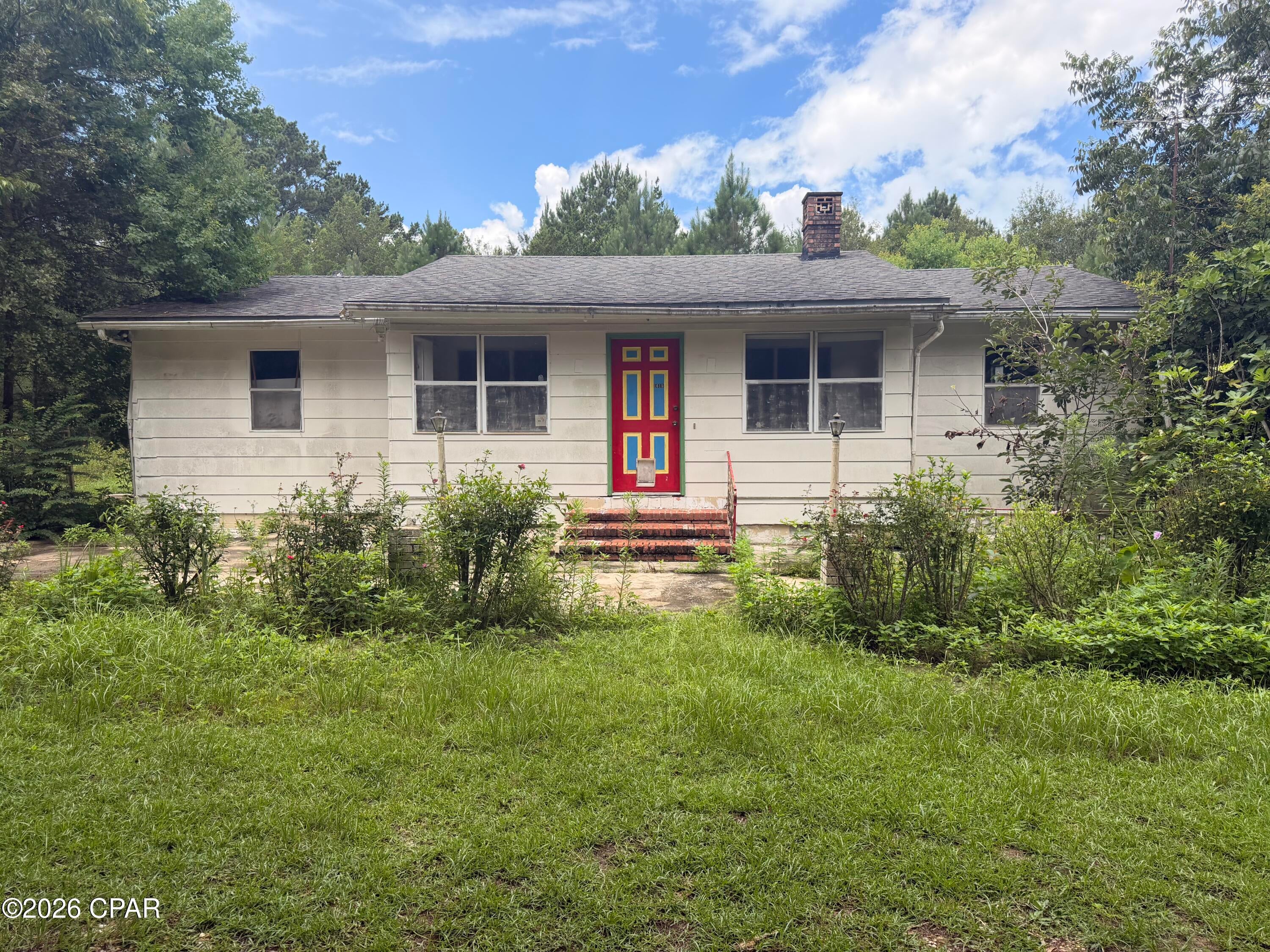 Looking for a fixer upper on 5 acres in the country. This property has so much potential. Property is fenced and has several outbuildings. House needs a lot of work , but with some TLC it could be a nice home again. Great opportunity at an Awesome Price. Property will not last long.