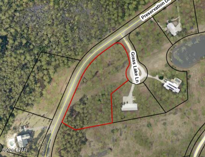 This 2.29 acre Lot is an absolute steal at $134,500. You simply will not find a better deal in the highly sought after gated, waterfront community of RiverCamps. This large Lot has paved access and is located near the community boat ramp and dry-boat storage. Listing agent is working directly with a designer and builder with pre-approved house plans, or you can customize to build exactly what you want. RiverCamps is an outdoor enthusiasts dream. 1500 acres, less than 450 homesites with 1000 acres committed to conservation. 7 miles of connected trails, a private community boat ramp with direct access to West Bay, the Intra-Coastal Waterway and a 30-minute boat ride to Shell Island and the Gulf. RiverCamps is conveniently located 10 minutes from the Northwest Florida Beaches International Airport and the new FSU Tallahassee Health Medical Campus and 180 bed Hospital and 10 miles from Pier Park and the white sandy beaches of Panama City Beach.  Publix grocery has broken ground less than 2 miles away and is expected to be open by March 2027. There is an additional 500,000 sq ft of planned retail space adjacent to Publix. RiverCamps is close to everything yet far from the crowds and traffic. The new pool and pavilion are now open and the fitness center is expected to be completed by late 2026.