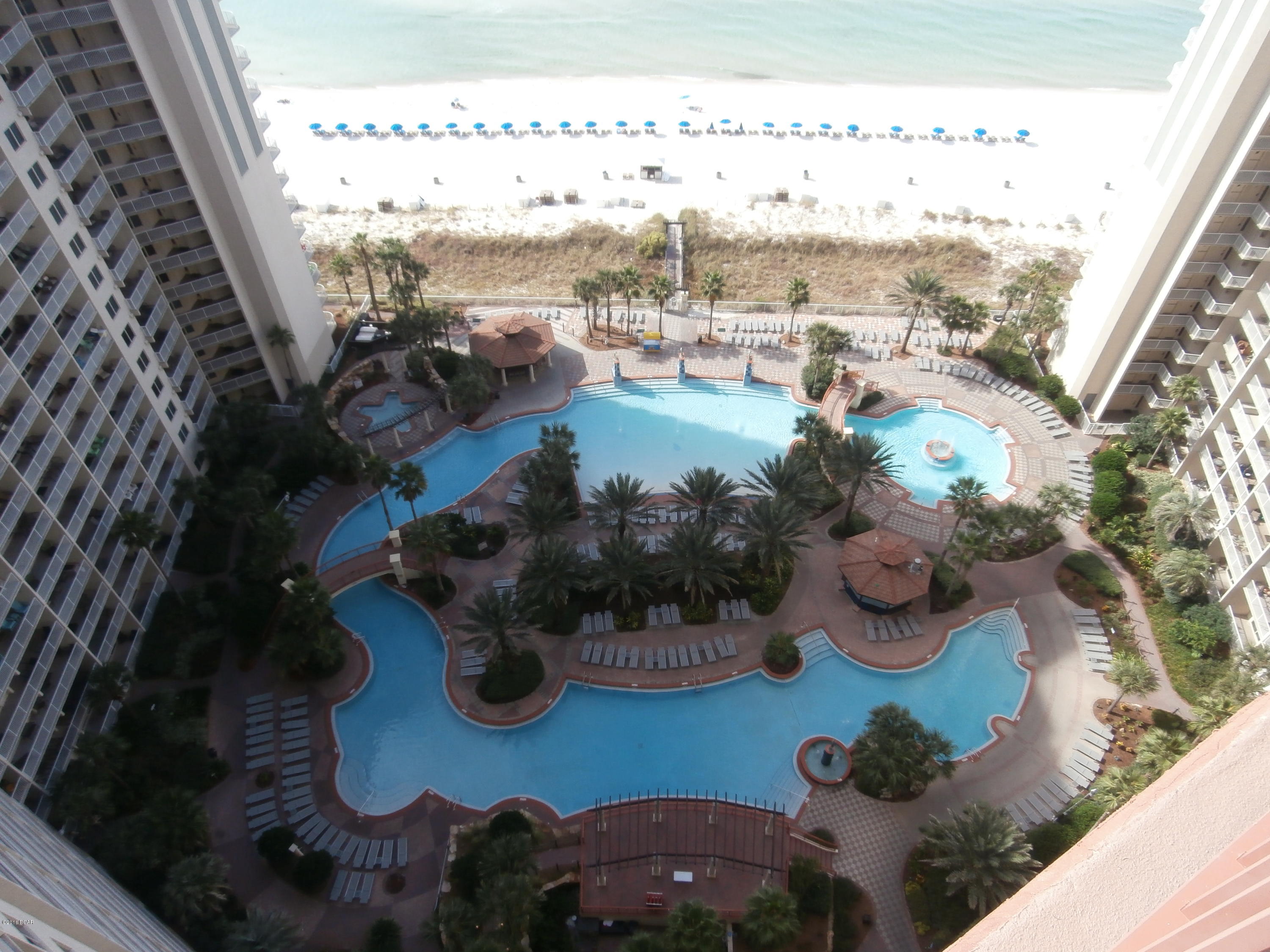 Resort style living in this upscale 1 bedroom 2 bath condo. Tastefully furnished. Gulf view from the master bedroom. Enjoy the lush pool area, fitness center with a steam room, inside pool as well. Condo is located on the west side of Thomas Drive, near Pineapple Willie's. Close to shopping and dining. $1625 per month, includes water, sewage,garbage,cable,internet and phone. The only utility you pay for is electricity.