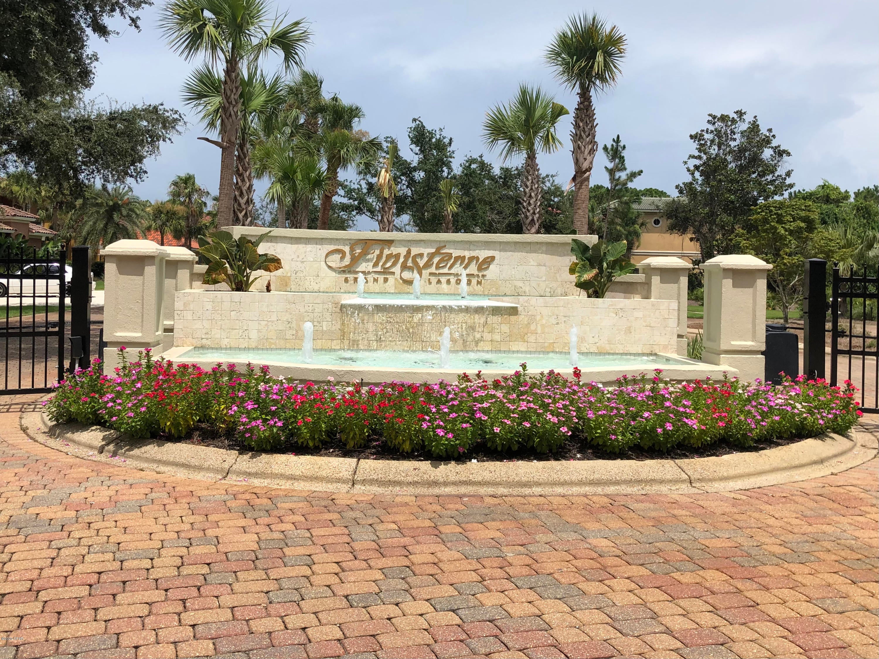 Great opportunity to buy one of the premium lots at a fantastic price. Finisterre, exclusive waterfront planned community in Panama City Beach.  Located on Grand Lagoon featuring elegant Mediterranean themed architecture. Amenities include lush landscaping, private gated entry, water views, tennis courts, community boat dock, close to marinas, beaches and restaurants. Large lot across from tennis courts with considerable privacy.