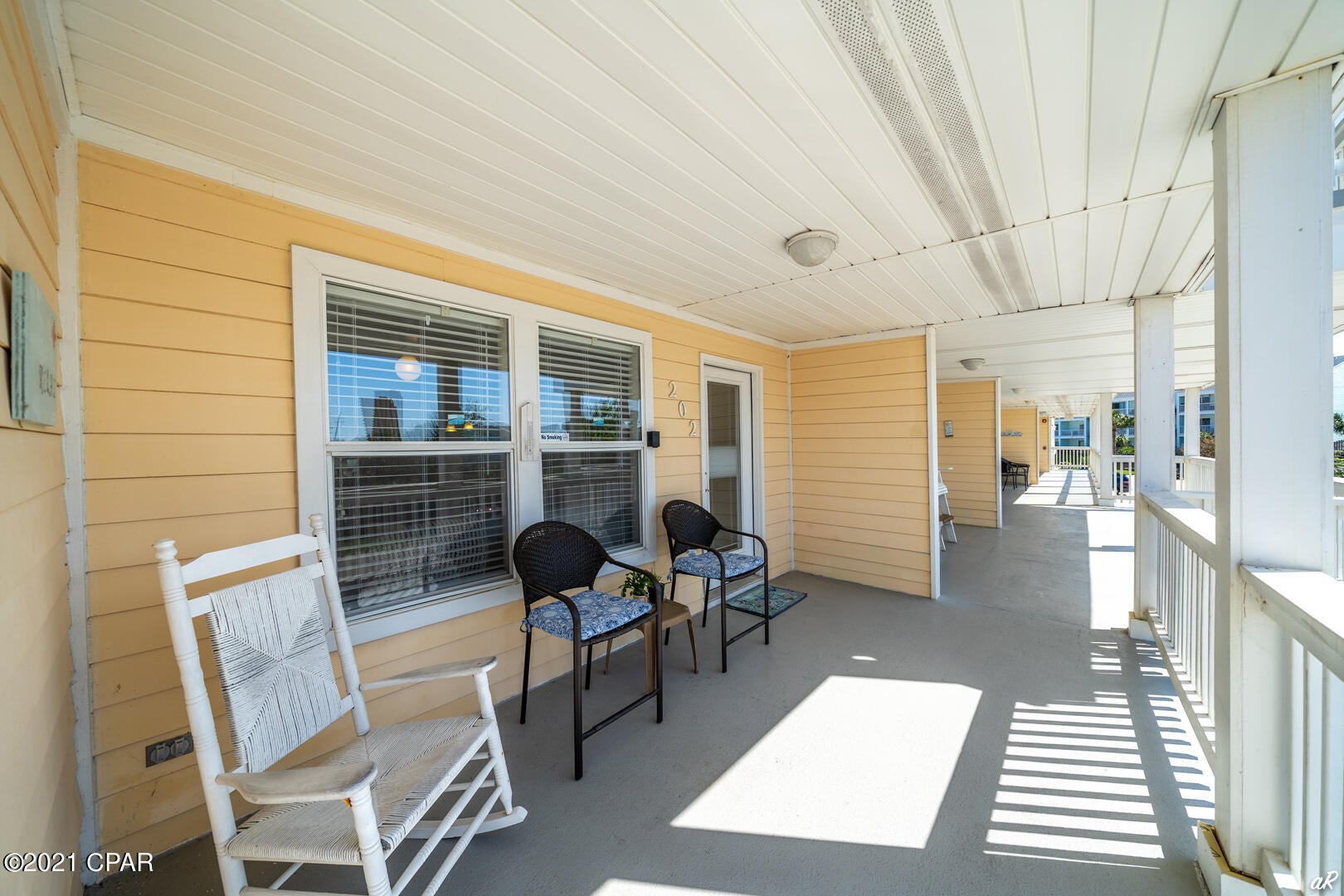 Our New Beach condo favorite! This beautifully remodeled 1 bed 1 bath Peachtree condo is and only steps away from the beautiful white beaches. Peachtree Place is an intimate complex situated directly across the street from the public beach access 73, with a great community pool. This unit has new LVP flooring throughout, freshly painted, New countertops, stainless steel appliances, new furniture, and furnishings. Converted Bunk room into large custom pantry (can be redefined) The front balcony area is enormous and welcoming. There is also a private back balcony overlooking a preserved area. Did we mention that this unit is furnished and most items convey? Wow! Not only is this unit fantastic, but the complex is one of our favorites too! It has just the right amount of amenities to keep fees low. The location is brilliant and ready for short-term rental or your perfect beach getaway! Close to grocery stores, Pier Park, and other entertainment.