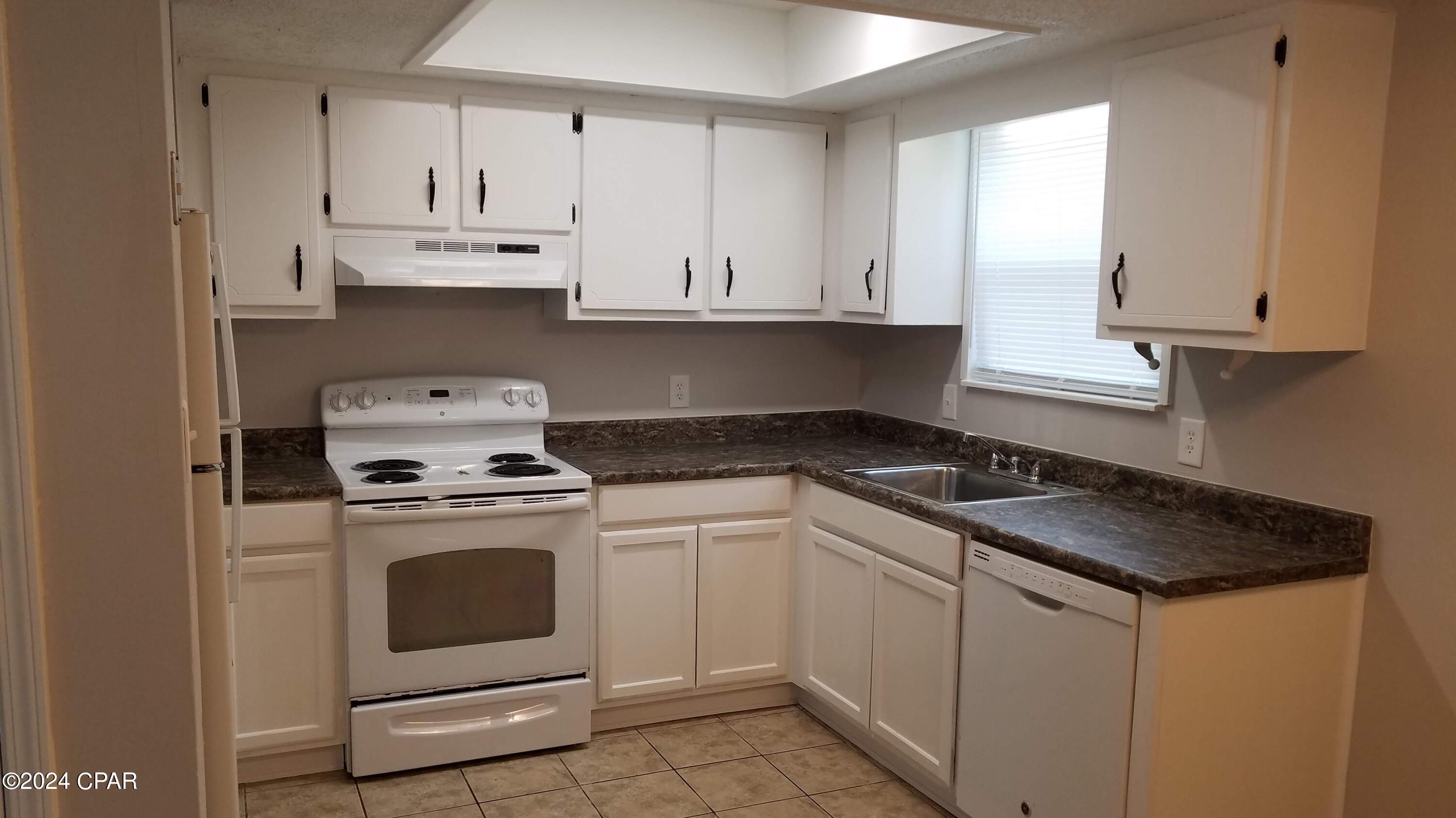2-bedroom, 1-bath, neat and clean 1st floor apartment in Panama City Beach, FL, off Joan Ave. This all-electric unit features vinyl plank flooring and a bright, airy layout. The primary bedroom includes a patio, and the kitchen comes with a dishwasher. Washer/dryer hookups are included. Ideal for those seeking a well-maintained, comfortable living space in a desirable beach area location.
