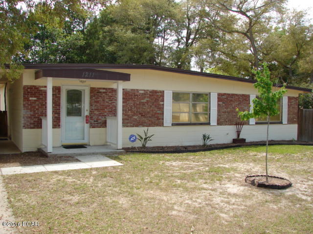 Home located near Tyndall Air Force Base. This home features large bedrooms, a fenced back yard, a tool shed in back yard, bonus room, and a convenient attached car port