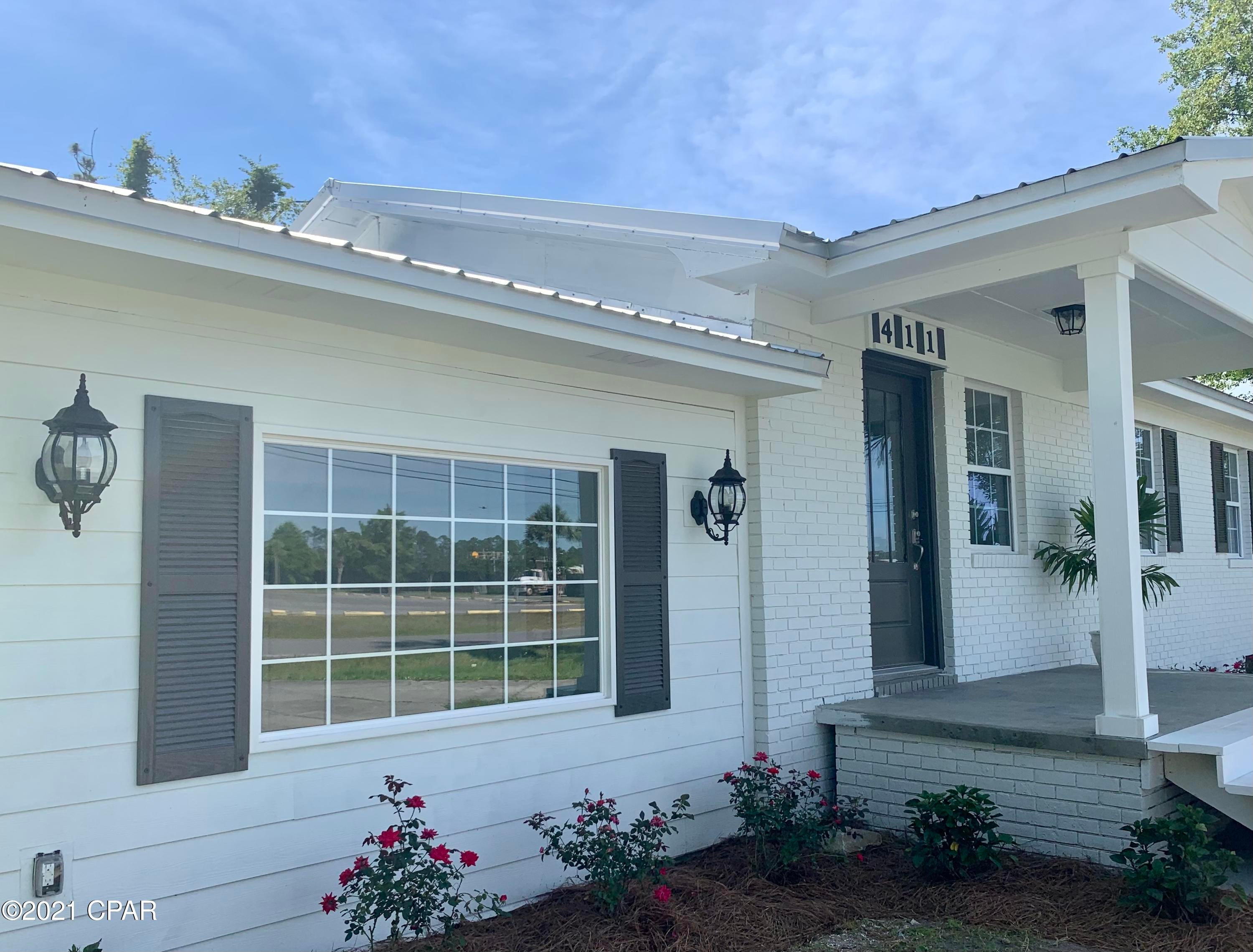 Close your eyes and picture a precious makeover with a water view of North Bay and quick access to the popular A.L. Kinsaul Park across the street.  Add a friendly dog park close by, a big back yard with room for a pool or for an addition to the home.  Check out the carport in back for your vehicle or other types of storage.  Schools are very good here and the price of this charming house is affordable.  This is a great first home or investment and should be a great change of scenery for someone who loves to walk to the water or who could enjoy the porch with the view---not to mention what you see through the picture window in the Master Bedroom will be a bright spot.  Alpha Foundations was called in during the re-model to insure the flooring would lay better. New appliances, lighting, and exterior doors, new Master Bedroom windows, new Bathroom vanities and mirrors, new faucets, new backsplash and even a new shower to make a full second bathroom- New waterproof laminate floors, new fans and exterior lights too! New steps on front porch and new steps to Master Bedroom. Freshly painted inside and out!