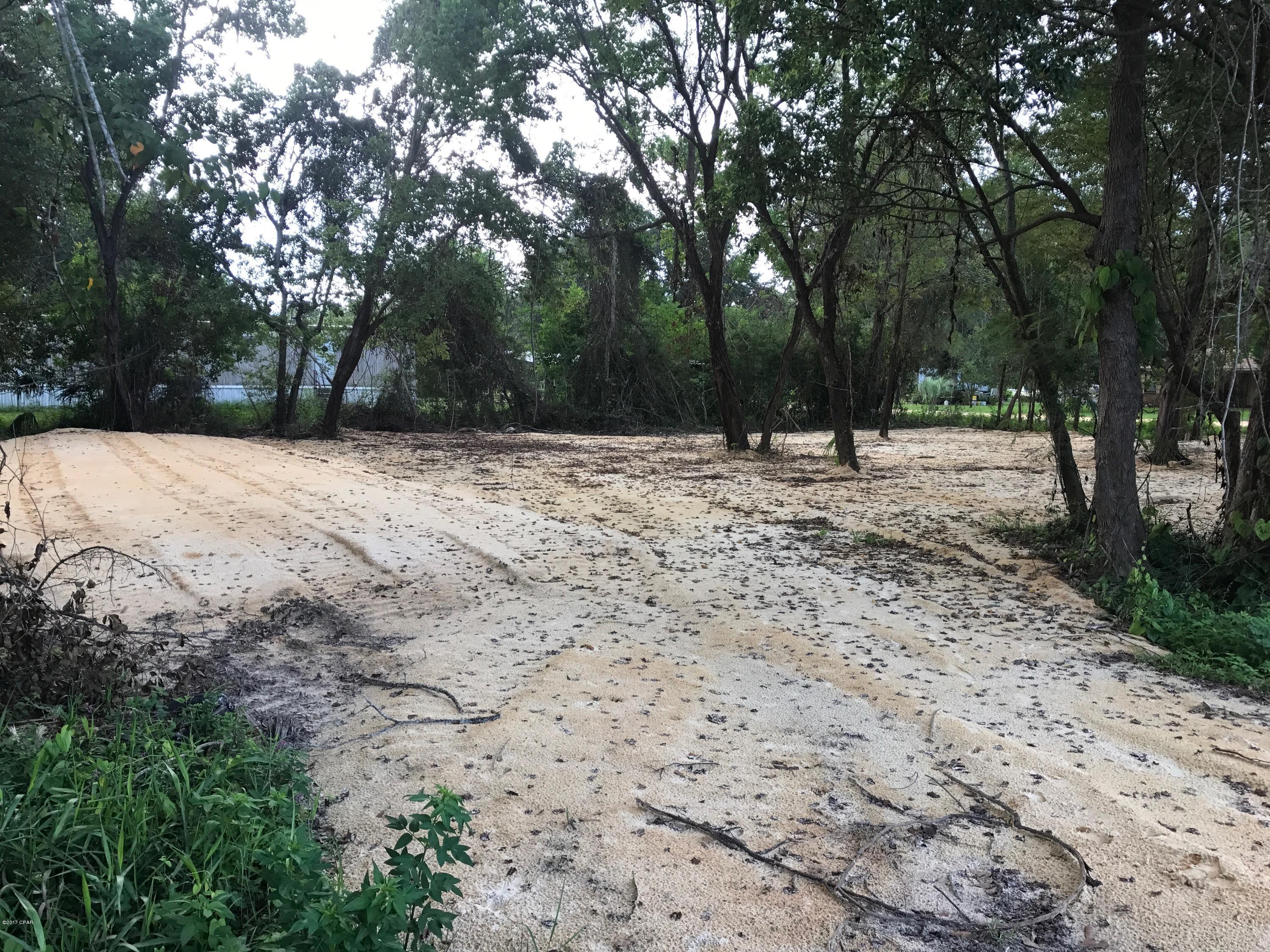 Cleared lot with plenty of trees for privacy.  You will love this corner lot located just a couple minutes north of Lynn Haven in Southport.  All you need is to start building your dream home!!