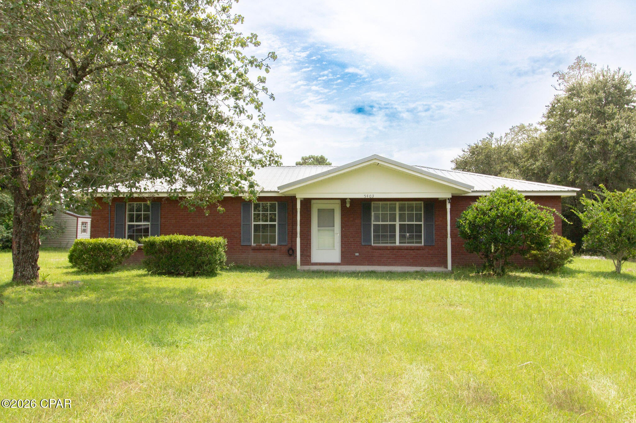 Adorable brick home offering comfortable country living at its best. This charming 3-bedroom, 2-full-bath residence features a practical split floor plan that gives the primary suite extra privacy. The master bedroom includes its own ensuite bathroom. The kitchen is designed for everyday living and entertaining, with plenty of cabinets and counter space, a dining room just off the kitchen, and a convenient laundry room nearby. An extra bonus room adds valuable flexibility--use it as a second living area, home office, playroom, or whatever your household needs most. A warm, functional layout in a setting that feels like true country living. Brand new LVP flooring and carpet and fresh paint throughout!