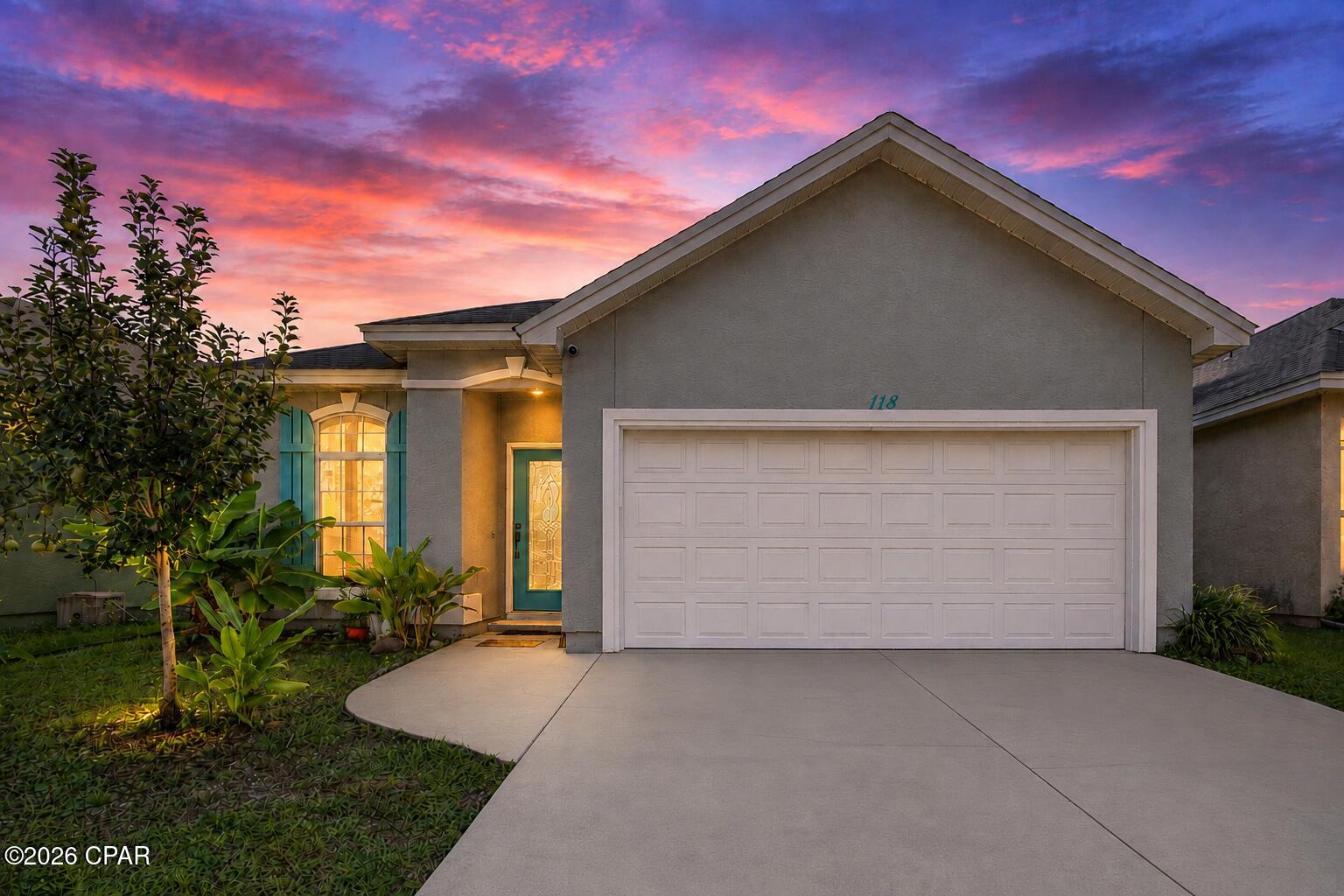 CURRENTLY UNDER CONTRACT, SELLER WILL CONSIDER BACKUP OFFERS. Just half a mile from public beach access and the white-sand beaches, this 3-bedroom, 2-bath home puts the best of the beach lifestyle just around the corner, all with NO HOA! Start the morning walking, biking, or golf-carting to a local coffee shop and a walk along the beach, and come home to a comfortable, spacious layout designed for everyday living.

Inside, 9-foot ceilings, crown molding throughout, abundant natural light and decorative wainscoting add character from the moment you walk in. The open living area offers plenty of room to gather, with space for an additional dining area, while the charming breakfast nook creates its own sunny spot for morning coffee or casual meals. The kitchen opens to the main living space and features generous cabinetry, ample counter space and stainless steel appliances.

The home's coastal-inspired color palette gives it plenty of personality, while also offering an easy opportunity for a new owner to make the space completely their own with simple cosmetic updates and finishes that fit their style.

The primary suite includes a bathroom with separate soaking tub and shower, and two additional bedrooms provide flexibility for guests, family, a home office, or hobby space. Outside, enjoy a quiet, fenced backyard with a covered porch for relaxing, grilling, or entertaining, and an irrigation system to help maintain the yard. A whole-house water filtration system adds even more benefit! 

Residents also have access to a shared residential lot, offering a convenient area commonly used for overflow parking and recreational vehicles*.

Conveniently located near Hutchison Beach Elementary, Surfside Middle School, and Arnold High School, the home is also just minutes from Pier Park shopping, dining, and entertainment. 118 Gardenia makes it easy to enjoy the best of Panama City Beach while still having the space and comfort of a full-time home!

*Buyer to verify permitted uses.