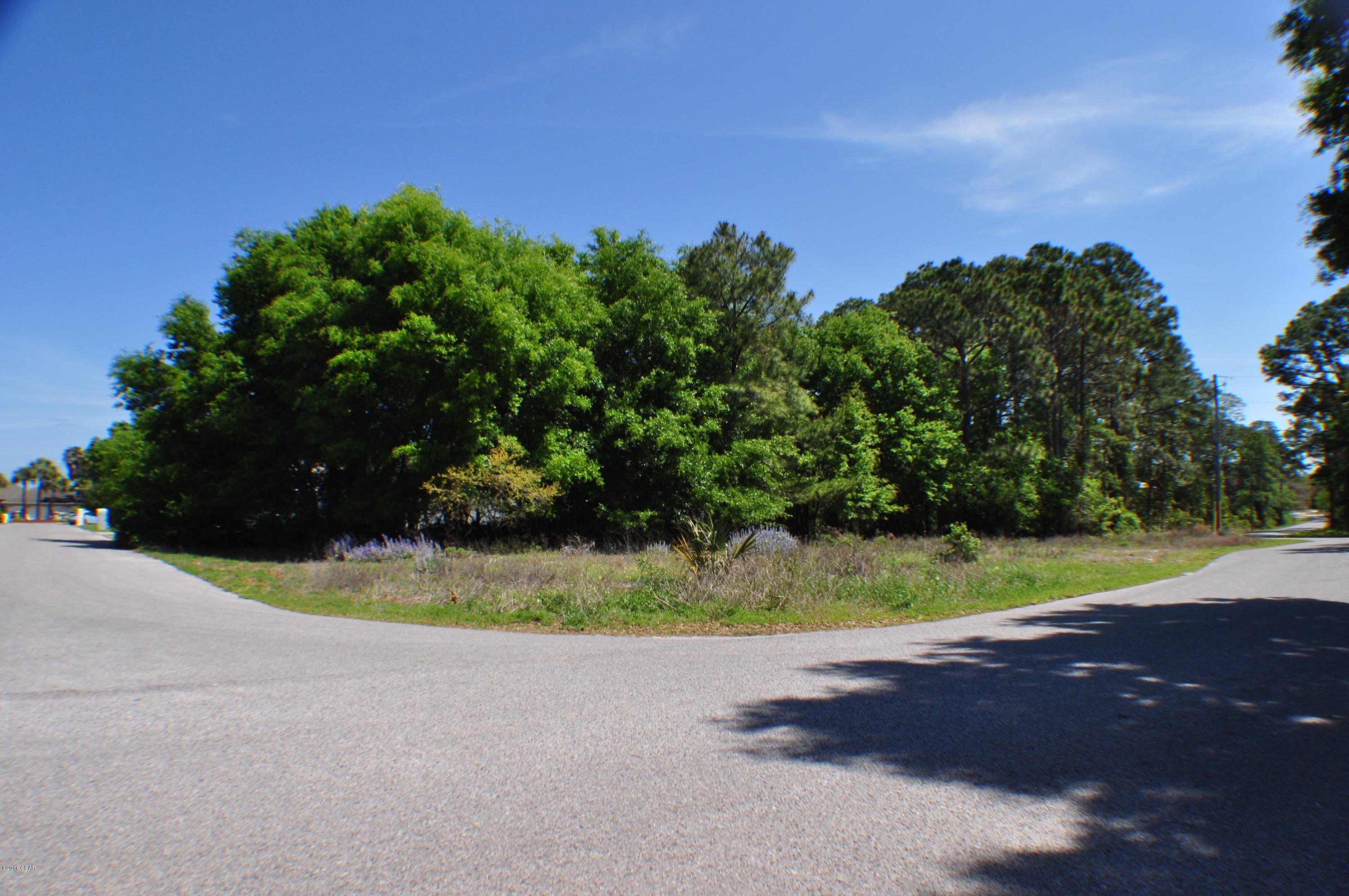 CURRENTLY UNDER CONTRACT; SELLER ACCEPTING BACKUP OFFERS. Building lot available in Grand Harbor, Panama City Beach's best kept secret! Fantastic building lot in the Grand Harbor community near Bay Point!  This is a corner lot, approx. 84x162. Quiet community, great neighbors and you might even see a deer or two roaming around! Lots of large, custom built homes and you're just around the corner from Bay Point Marina and golf courses, the Navy base is only 5 minutes away and you're convenient to the beach! All info is approx. and must be verified by Buyers if important.