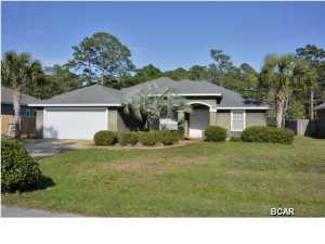 Nice 3BR/2BA home in Hidden Pines. This home is close to the Navy Base, Beach, Schools and good restaurants. There is a in-ground Saltwater pool with screened enclosure that backs up to Green space woods. Extra large 2 car garage, split-bedrooms, high ceilings in the living room with a corner fireplace and a nice formal dining room. The kitchen has Stainless Steel Appliances with an upgraded stove/oven that is dual gas and electric with a warming drawer. Large 18 inch tile in all the living areas and bath. This house is in good condition with only a couple living there and no kids. Make your appointment today before it is gone.