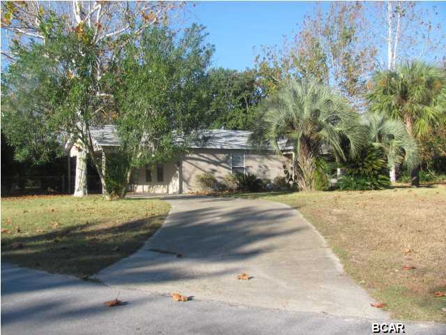 Very Nice 2 bedroom 2 bath home all tile flooring with extra room for office or bonus room off the kitchen- full size washer & dryer ''AS IS'' & fenced back yard-the home offers a carport for parking and the property is on a corner lot partial cul-de-sac property is on septic.