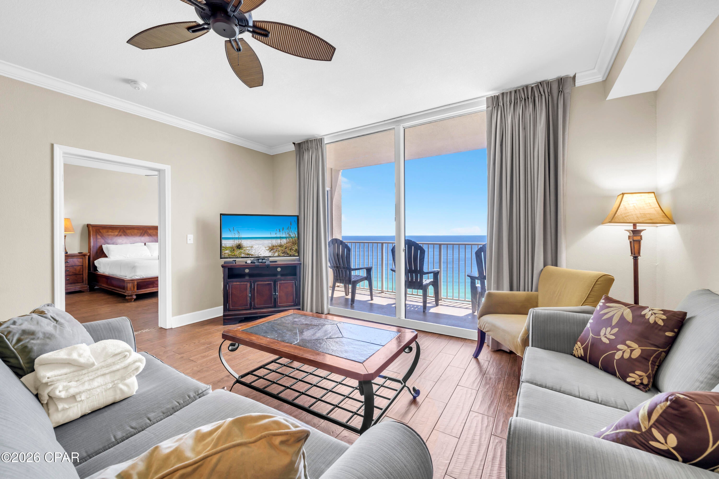 Experience beachfront living at its finest in this beautifully maintained Gulf-front residence at Tidewater Beach Resort, one of Panama City Beach's most sought-after resort destinations. Designed for both personal enjoyment and strong vacation rental appeal, this spacious floor plan features an open-concept layout that maximizes natural light and showcases breathtaking views of the Gulf. One of the residence's standout features is the Gulf-front primary suite, allowing you to wake each morning to panoramic emerald water views and direct balcony access--a highly desirable floor plan rarely found in many beachfront condominiums. Hard surface flooring throughout provides a clean, low-maintenance interior that's ideal for coastal living and rental use alike. Offered in turnkey condition, this property is ready to enjoy from day one while eliminating many of the updates buyers often face. Tidewater Beach Resort remains one of Panama City Beach's premier Gulf-front communities, offering over 600 feet of sugar-white beachfront along with an exceptional collection of amenities including multiple outdoor pools, a heated indoor pool, Gulf-view fitness center, on-site movie theater, coffee bar, and an exclusive top-floor owner's lounge. Ideally situated on the desirable west end of Panama City Beach, you're just minutes from Pier Park's shopping, dining, and entertainment, providing the perfect combination of resort-style beachfront living and everyday convenience.