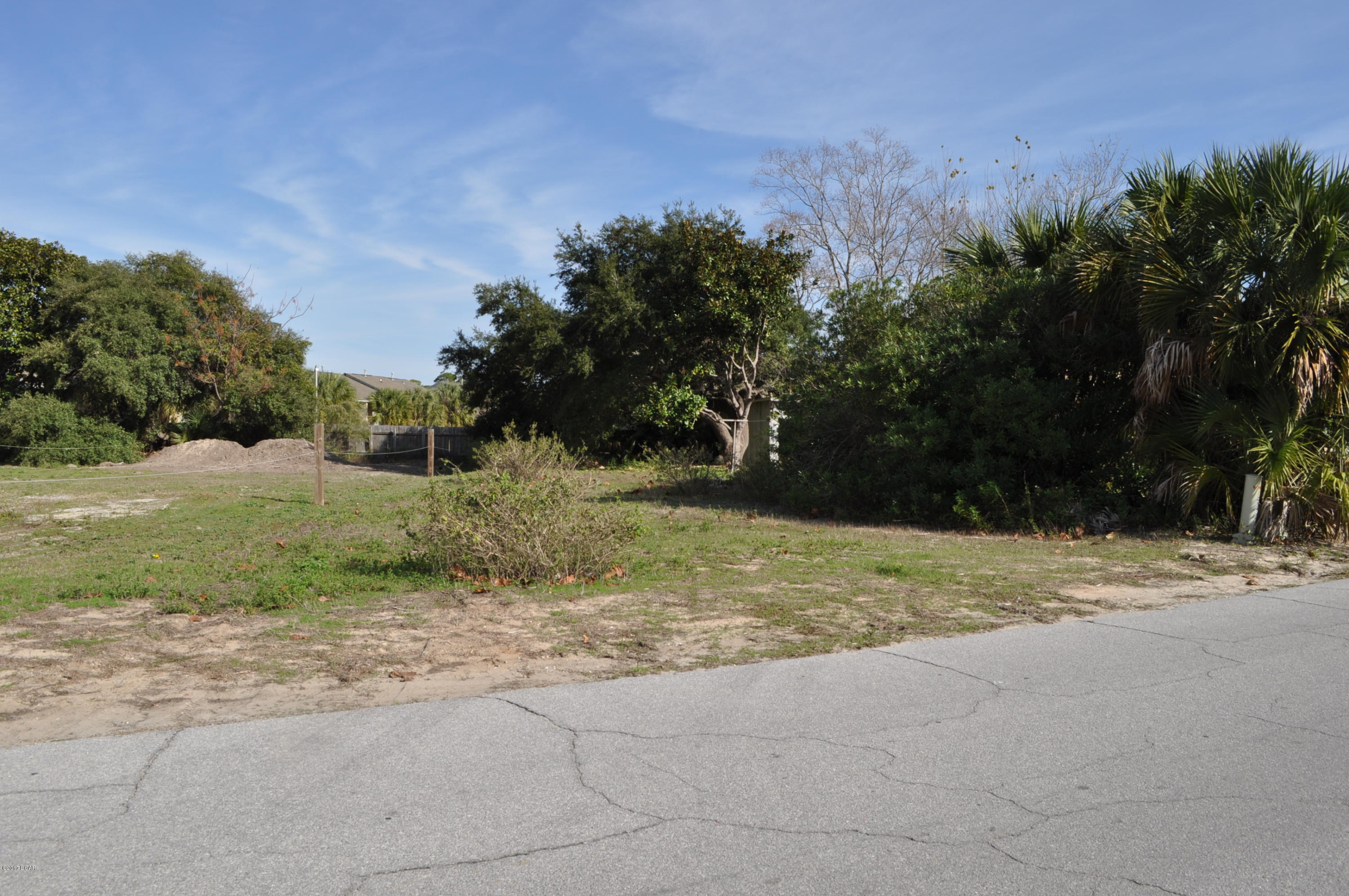Great building lot one block from the beach!  This is an approx 50x100 lot between Front Beach and Middle Beach Roads. The lot has a partial view of the Gulf and zoning is Commercial High-Intensity according to Panama City Beach zoning department. Please verify if important.