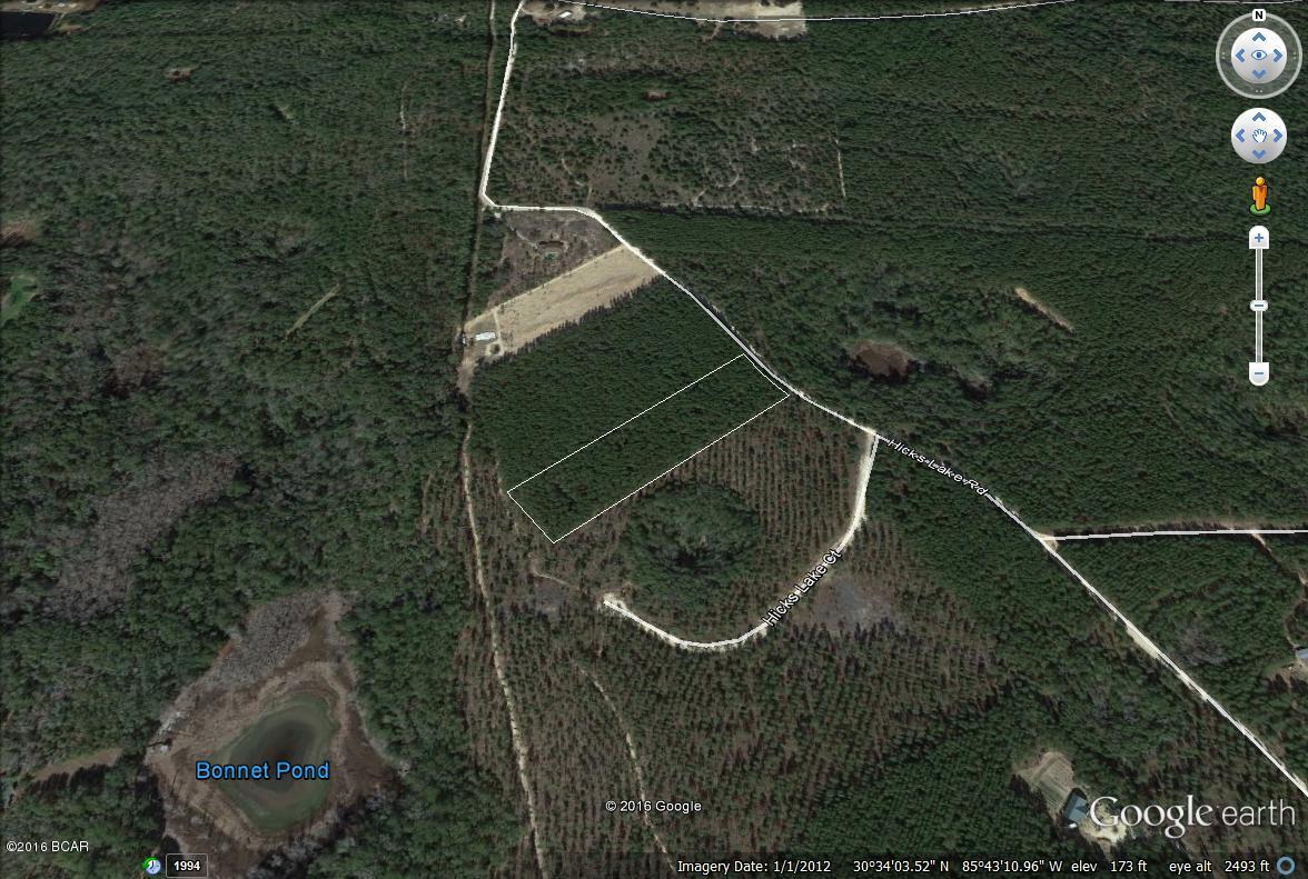 LARGE PARCEL LESS THAN 5 MINUTES TO HICKS LAKE LANDING AND JUST A SHORT DRIVE TO PANAMA CITY BEACH! This property is easily accessible, conveniently located, and features nearly 5 acres of space and privacy. The boat launch is less than a mile away. If you want to double your space, the adjoining lot is also available for purchase. Fish, hike, or just relax in your own piece of paradise. This is a great buy in a great location. CALL TODAY!!!
