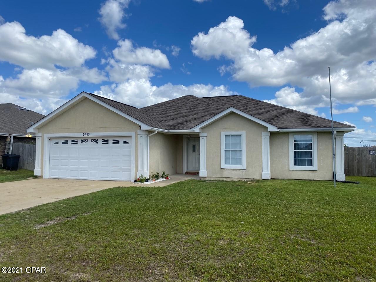 Centrally located, not far from Tyndall or Navy Base. Gorgeous hardwood floors in large living room, dining room, kitchen and foyer. Kitchen has granite counter tops and lots of storage/cabinet space, separate eating area and breakfast bar. Tile in both full bathrooms. Master bath has a separate shower and tub along with a double vanity. Master bedroom has a spacious walk in closet. Interior laundry room. Ceiling fans throughout. Privacy fenced large back yard. Finished two car garage with garage door opener. Covered porch with ceiling fan. Neighborhood has street lights and sidewalks throughout. Walking distance to schools