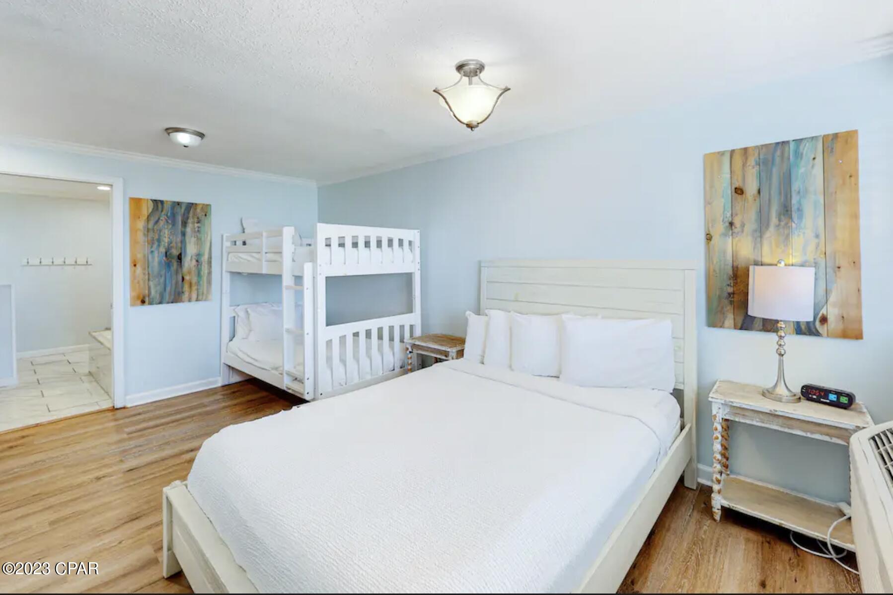 UNDER CONTRACT, SELLER WILL CONSIDER BACK UP OFFERS. Large price reductions makes this and the neighboring unit, the lowest priced renovated units in the building! Don't miss out on this turn key unit in one of PCB's most iconic beach front buildings! Fountainebleau Terrace boasts a large on site pool & parking, BBQ/Grilling area, large beachfront deck, and of course, amazing views of the Gulf of Mexico. This unit has LVP flooring, crown molding, and a queen bed plus bunks so you can sleep 4 guests. This is one of the lowest prices you can a beachfront vacation property with resort amenities in PCB! In the perfect central location, this property is less than a mile to Gulf World,  two miles to Pier Park and 4 miles to Wonderworks, Ripley's Believe It or Not, and Zoo World! Your HOA dues cover, trash service, pest control, cable and even electric! The neighboring unit 429 is also offered for sale! Contact the listing agent today!