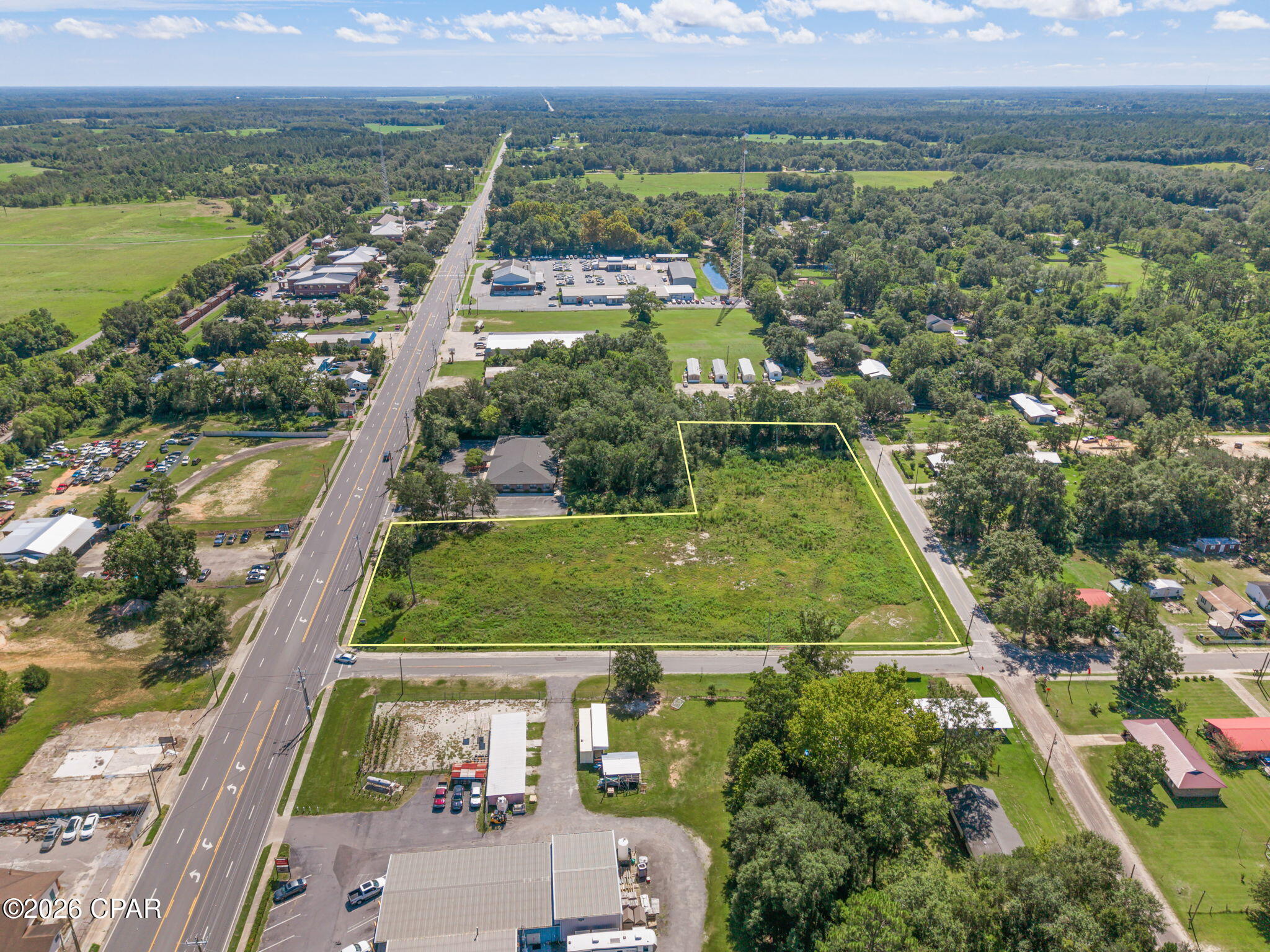 Prime Commercial Opportunity on Hwy 90 in Chipley! This 2.99+/- acre parcel offers excellent visibility and accessibility in a convenient location along one of the area's primary thoroughfares. Recently cleared and ready for its next use, the property features approximately 217 +/- feet of frontage along Hwy 90 and additional access from Orange Street and 1st Avenue, providing multiple points of ingress and egress. With paved road access, four-lane highway frontage, and water available, this property provides a great setting for a variety of potential commercial uses. Its corner location and easy accessibility make it an attractive option for investors, developers, or businesses looking to establish a presence in the growing Chipley area. Conveniently located just east of the Hwy 90 and Hwy 77 intersection, this cleared commercial parcel is ready for development.