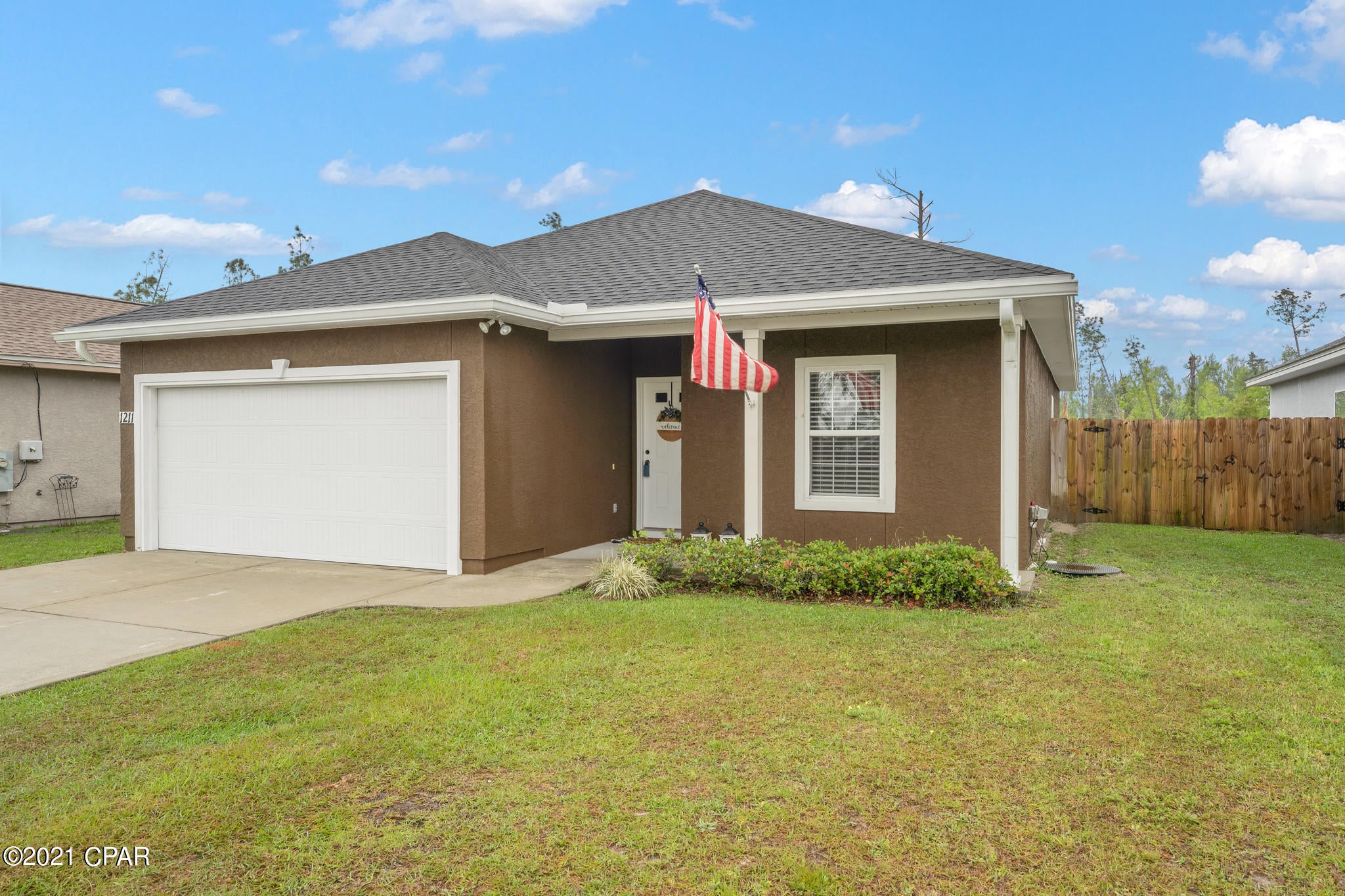 CURRENTLY UNDER CONTRACT. SELLER ACCEPTING BACKUP OFFERS.  This well-maintained 3 bedroom, 2 bathroom Lynn Haven home is conveniently located just minutes from restaurants, schools, and various shopping!  The home features an open floor plan with an oversized laundry room with extra cabinet space for storage, stainless steel appliances, a covered back porch perfect for grilling, two-car garage, and a newly installed privacy fence.  The large master bedroom suite features a walk-in closet, and the master bathroom has tile flooring, walk-in shower, and a sizable soaking tub. A new roof was recently installed in 2019 and there is fresh new paint throughout.  Built in 2013, this home boasts comfort from the moment you enter the front door!