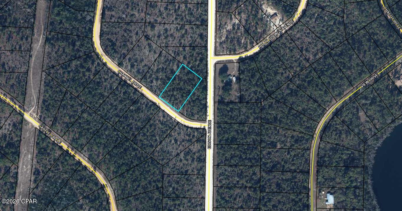 Beautiful wooded lot in a natural setting, close to McCormick Lake and Club House part of the Compass Lake subdivision with access to both Lakes, rental boats and 2 clubhouses. Join voluntary HOA association to have full access to all amenities. There is a boat launch area on Compass Lake open to the public.  This area is centrally located to Panama City Beach, Dothan, AL and Tallahassee.