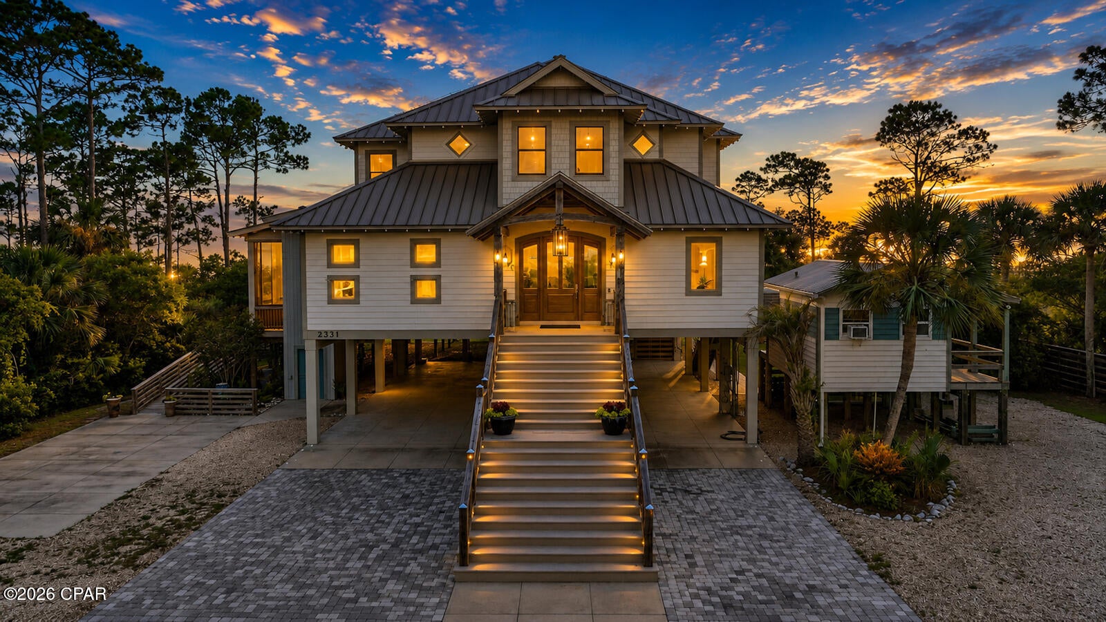**Welcome to GRACIE**--a private bayfront legacy estate where timeless craftsmanship, Old Florida charm, and the natural beauty of St. Joseph Bay come together to create one of the most extraordinary waterfront properties on Florida's Forgotten Coast. Situated on **2.44 acres across two contiguous mixed commercial use parcels**, this remarkable estate offers privacy, tranquility, and endless possibilities. Whether you envision an exceptional waterfront residence, a multigenerational family retreat, an upscale fishing lodge, a luxury vacation rental, or an unforgettable wedding venue, this property provides the flexibility to bring that vision to life. From the moment you arrive, you'll appreciate the quality, character, and attention to detail found throughout the home. Warm timber-frame construction, soaring ceilings, custom finishes, and expansive windows frame breathtaking views of St. Joseph Bay, while multiple screened porches and outdoor living spaces invite you to slow down and embrace the peaceful rhythm of coastal living. Enjoy evenings by the outdoor fireplace, entertain from the outdoor kitchen, relax in the hot tub beneath the stars, or simply unwind as spectacular sunsets paint the sky over the bay. A private boardwalk leads to your **private dock**, providing direct access to one of Florida's most pristine estuaries. Spend your mornings fishing for trophy speckled trout, redfish, and flounder, your afternoons scalloping in the crystal-clear waters of St. Joseph Bay, or exploring by kayak and paddleboard. Here, dolphins frequently pass by, coastal birds fill the skies, and every day feels like a vacation. The thoughtfully designed home offers generous gathering spaces perfect for entertaining family and friends while maintaining warm, inviting areas for quiet moments overlooking the water. Every room has been carefully crafted to maximize comfort, functionality, and the incredible waterfront views that define this one-of-a-kind property. Both parcels are zoned **Mixed Commercial Use**, This allows for a variety of future uses, currently a luxury residence, boutique hospitality, vacation rental opportunities, wedding venue, fishing retreat, or other approved commercial ventures. The front parcel also offers the potential for short-term RV accommodations and includes a pole barn with power and water already in place, providing even greater flexibility. Properties of this caliber are rarely offered. Combining acreage, privacy, direct bay frontage, mixed commercial use zoning, and access to world-class fishing and scalloping, **GRACIE** is far more than a home; it's a legacy investment, a destination, and a place where generations of family and friends will gather to create memories that last a lifetime. Experience the peace, serenity, and unmatched beauty of St. Joseph Bay, where every sunrise inspires, every sunset amazes, and every day feels like you're exactly where you're meant to be.
