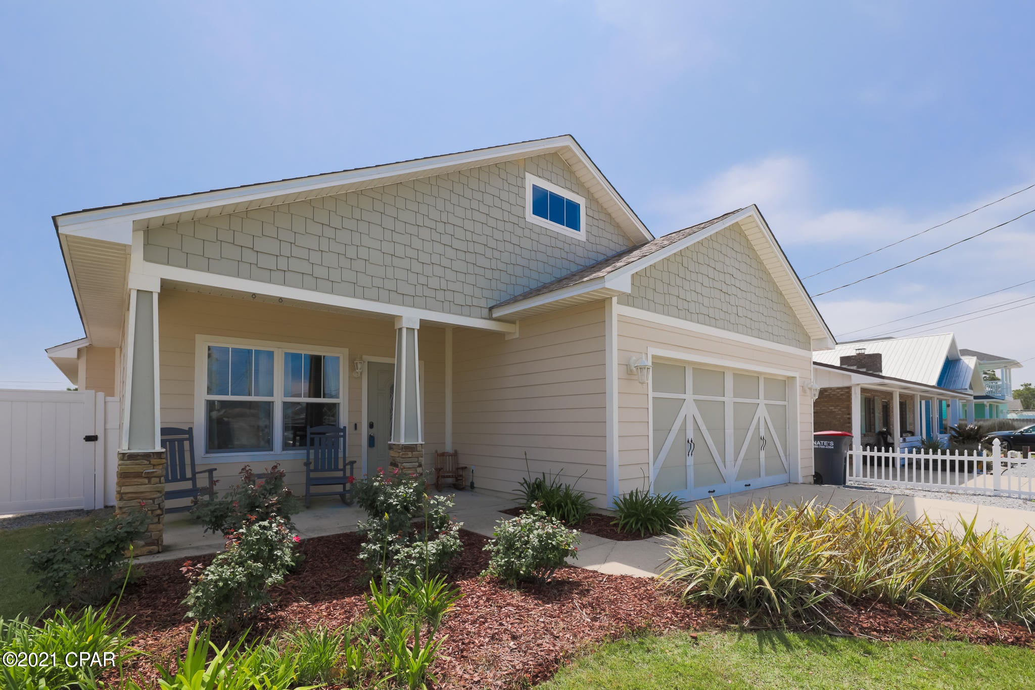 This custom home was built in 2011 with 9 foot ceilings throughout and all tile floors. Kitchen has granite countertops and tons of storage space including a large walk-in pantry. The hallway has built-in bookcases, guest bedroom has a deep walk-in closet, and a second bedroom with California closets. The master bedroom is spacious and the master bath has a separate walk in shower, garden tub and large walk-in closet, linen closets in both bathrooms and hallway, PLUS a storage room in the attic. Yard is fenced and professionally landscaped including a sprinkler system. The 10x11 shed with 8 foot ceiling is currently used as an office. Located only a few easy blocks from the beach, Richard Seltzer Park and a public boat ramp. All measurements are approximate, please verify if important