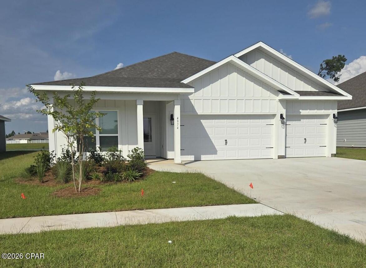 Welcome to 4978 Prater Road, a new home floor plan at Liberty in Panama City, Florida. Welcome to the Madison, a new home floor plan at Liberty in Panama City, Florida. The Madison is one of our many featured one-story homes at the beautiful Liberty community.

When you walk into the home, you are greeted by a long hallway that is the center point for bedrooms, the laundry room and garage, and leads to the open living room and kitchen. Beautiful engineered vinyl plank (EVP) flooring lines the main areas of the house and soft carpet covers the bedrooms.

The bedroom closest to the garage also comes with it's own bathroom, not shared in the main hallway. The bathrooms have beautiful white quartz countertops and white cabinets that enhance the beauty of this home.

Entering the kitchen and living room area, you will notice plenty of natural sunlight illuminating the main area. The living room has tray ceilings that open the room, making your living space feel much more comfortable. The kitchen has stainless steel appliances and comes with beautiful white cabinets. The large island has plenty of storage in it and every surface has elegant white quarts countertops. The dining area is located by the back door leading to the covered rear patio.

Walking into the large primary bedroom, you will also see tray ceilings and three windows that wash the room in natural sunlight. The primary bathroom has a spacious double vanity with white quartz countertops and white cabinetry. The walk-in closet is in the bathroom as well, perfect for when you get out of the separate tub or shower with glass doors.

Appreciate the convenience of a Smart Home technology package, featuring keyless entry and an intuitive control panel for your thermostat, lighting, and security systems. The exterior of this home features Hardie Color Plus Siding and is uniquely engineered to stand up to the harshest elements from wind, rain, fire, freezing temperatures, and hail. Dimensional shingles with 30-year warranty. A landscaped front flower bed at entry way and fully sodded yard. Our Liberty community features underground utilities making it less susceptible to damage from severe weather leading to fewer outages and more reliable service. Residents of Liberty can enjoy exclusive access to two amenity centers, complete with two pools, a children's splash pad, a playground for endless fun, and a well-equipped fitness center. Embrace the lifestyle you deserve where every detail is curated for your ultimate enjoyment.

Come and see for yourself why the Madison is a popular floor plan for new home buyers. To see this floor plan at Liberty, stop by our model home today or schedule an appointment online.