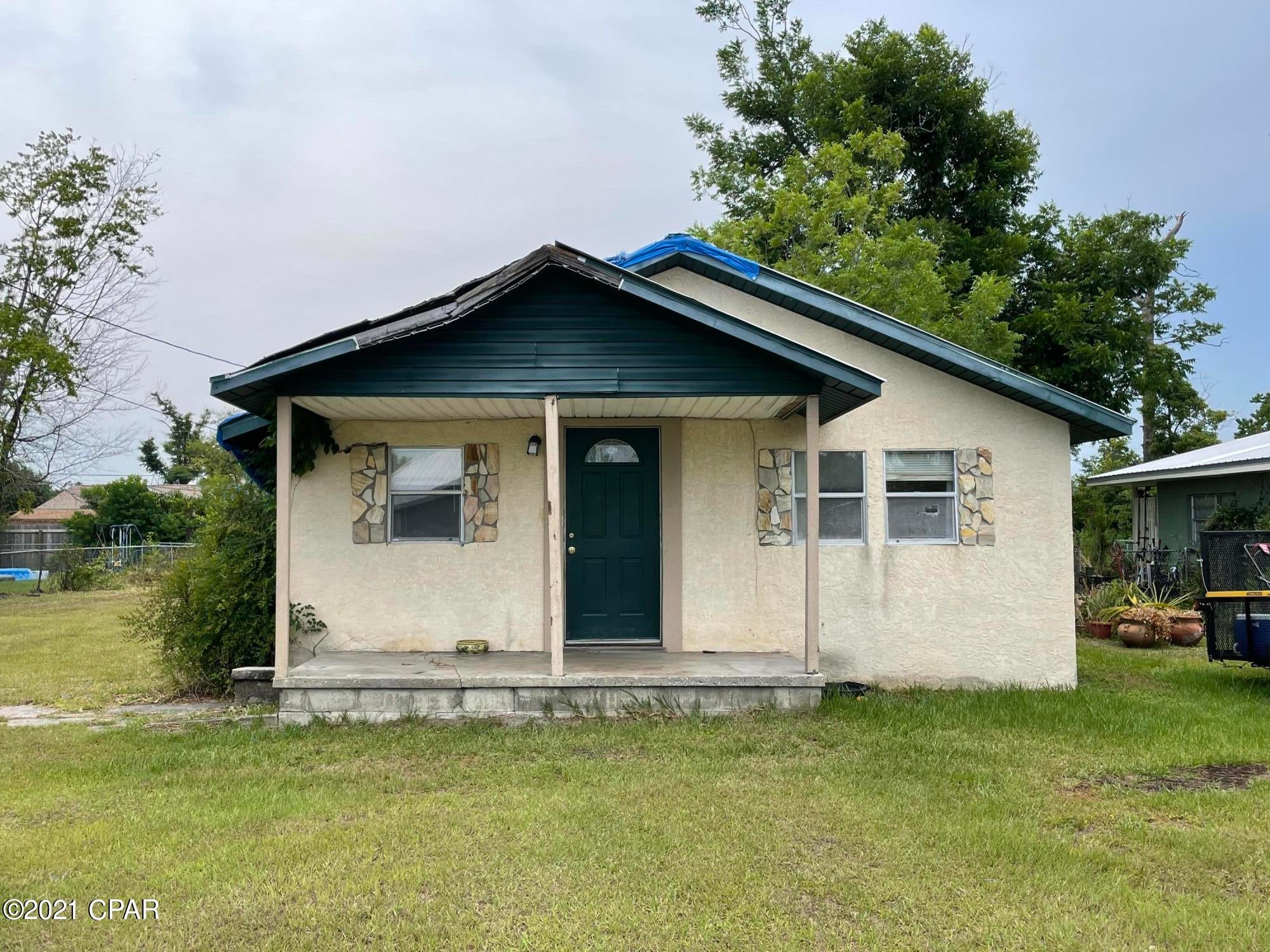 Opportunity Knocks! Hurricane Michael Damaged this 3 bedroom 1 bath home. Home is on a large lot located close to stores, restaurants, water activities, schools and parks. House has been tarped and re-tarped so there is little damage to ceiling.  Investor opportunity to rebuild this home that is being Sold AS-IS, Where-Is, and is priced accordingly. Seller to make no repairs, demolition, disposal of debris, or clean up. All measurements are approximate, please verify if important. Call your favorite realtor today!