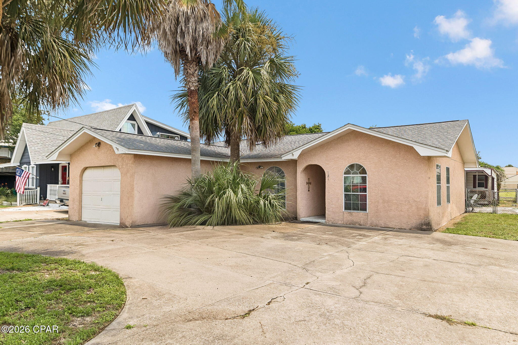 HOME IS UNDER CONTRACT, CONTINGENT & 72 HOUR KICK-OUT CLAUSE, EASY TO SHOW, BRING ALL OFFERS. Located just blocks from the white sand beaches of the Gulf, 2-bedroom, 2-bath home features a split-bedroom floor plan, each bedroom enjoys its own full bath and walk-in closet, making the layout ideal for guests, roommates, or a primary residence.

The living room offers vaulted ceilings, while the Florida room provides additional living space. Outside, you'll find a fully fenced backyard, mature palm trees, a patio, circular driveway with RV parking. 

Conveniently located just minutes from Pier Park, Frank Brown Park, the new state-of-the-art hospital currently under construction, Northwest Florida Beaches International Airport (ECP), shopping, dining, and entertainment, this property offers exceptional access to everything Panama City Beach has to offer.

The home is being offered in its current condition and presents a fantastic opportunity for buyers looking to update, renovate, or personalize a property in an excellent location. Whether you're searching for a primary residence, second home, or investment opportunity, the potential here is undeniable. Bring your vision and make this beachside property your own. HOME IS UNDER CONTRACT WITH 72 HOUR KICK-OUT CLAUSE