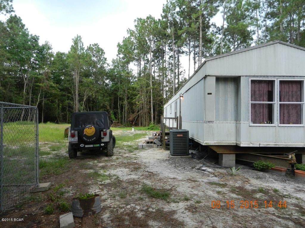 NEW SEPTIC TANK & NEW WELL in 2015! This .78ac lot is partially cleared in a quiet rural neighborhood. There is single wide mobile home on the property. It is being sold ''AS IS''. Fix this home up or bring your new one in! All sizes, ages and measurements are approximate; buyer to verify if important.