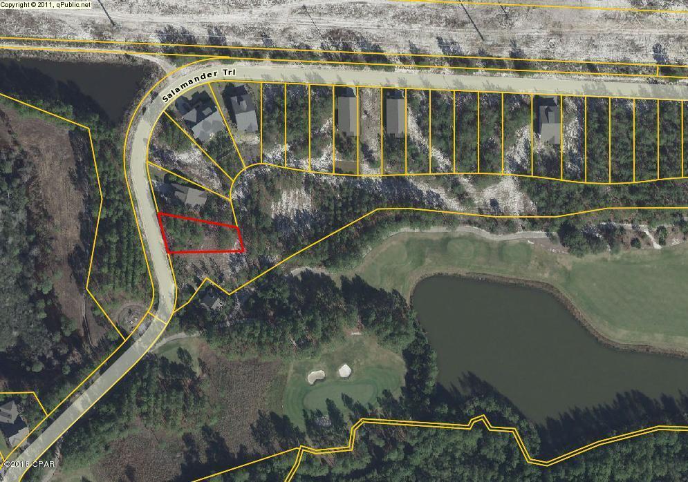 Golf Course lot located in Wild Heron. Build your custom home in this beautiful gated community that offers golf, fitness, tennis, pool, fishing and more! This is just a short drive over to 30A to enjoy some of the best restaurants or to pier park for the best shopping on the beach.