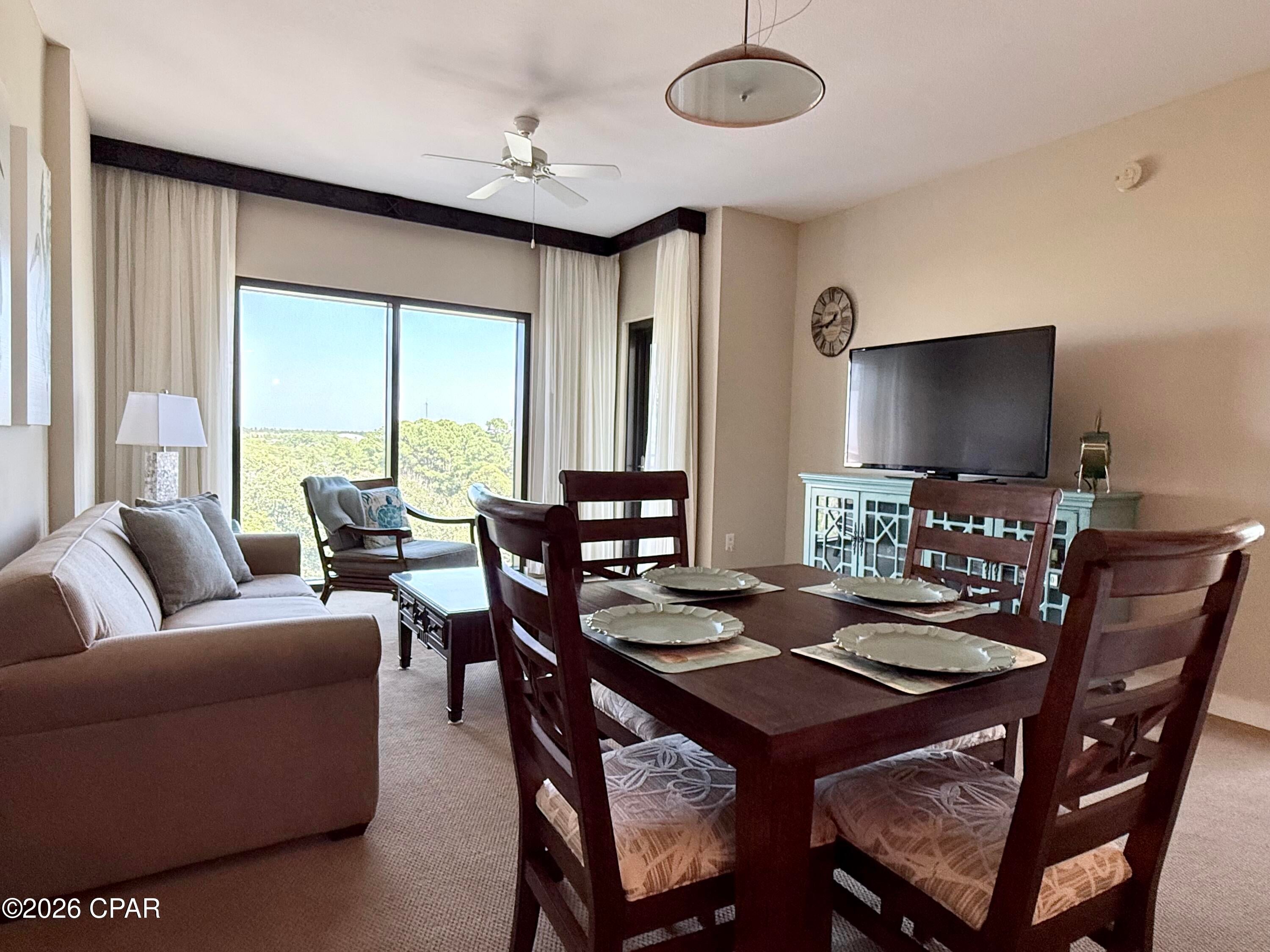 Origin 627 is a 1 bed, 1 bath condo on the back east corner of the building offering Sunrise and Gulf views from the balcony and bedroom.  Bought new by the current owners, and NEVER RENTED!  This is one of the cleanest, untouched condos in the building.  The appliances are in perfect condition, the carpet still looks new, the paint is pristine, furniture is immaculate, the window treatments look brand new, and everything works just as it should!  The balcony has also recently been repainted.  The owners have added some new decor, and several pieces of new furniture, as well as, a recently replaced hot water heater.  This property is being offered fully furnished all the way down to the linens and dishware.  It is ready for you to add your personal touches to it and call it home, home away from home, or add it to your new, or growing, investment portfolio.  Origin is one of the very few high-rise condos in PCB to offer interior corridors, keeping you safe and dry during inclement weather. 

Origin is located across the street from Sharky's beachfront restaurant and bar, and within walking distance to Pier Park, and a multitude of dining and entertainment options.  Origin offers many amenities including two BBQ grill/picnic areas, a heated pool, hot tub, theater, game room, laundry facility, vending, a gated community with 24-hour security, a Sunsations beach store located on the ground level, and the new Beaches and Cream convenient store offering eats and drinks right on property.  If you're in the market, don't miss the opportunity to see Origin 627 in person.  Give me a call anytime for your personal viewing, and see for yourself how clean and impressive this property truly is!