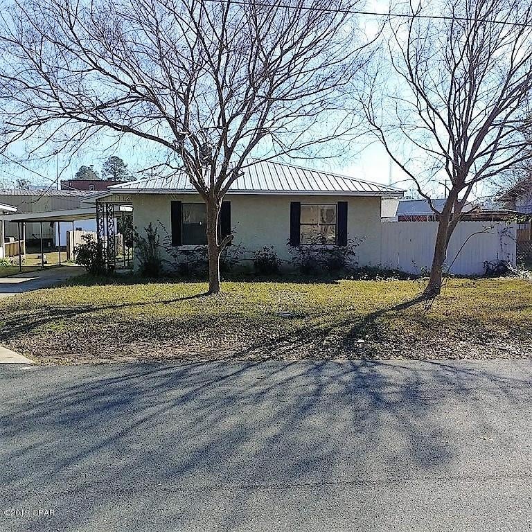 LARGE 4-bedroom, 2-bath home located in the center of Bonifay on a paved road.  Home has a very nice, large kitchen with a lot of cabinets and storage space.  New metal roof installed in June 2018.  Recent renovations include new laminate flooring, interior drywall and paint, water heater, ceiling fan and lights. In-ground pool is operational but has been emptied and covered.  Privacy fencing around pool.  Has attached carport with two concrete driveways. Large workshop in back with oversized garage door.    Seller is now in the process of painting exterior of home and putting a new metal roof on shed.  Seller is offering the home at $80,000 for all cash offers and will provide Owner Financing at $100,000 with $20,000 down payment, 7% interest, for a maximum of 15 years.