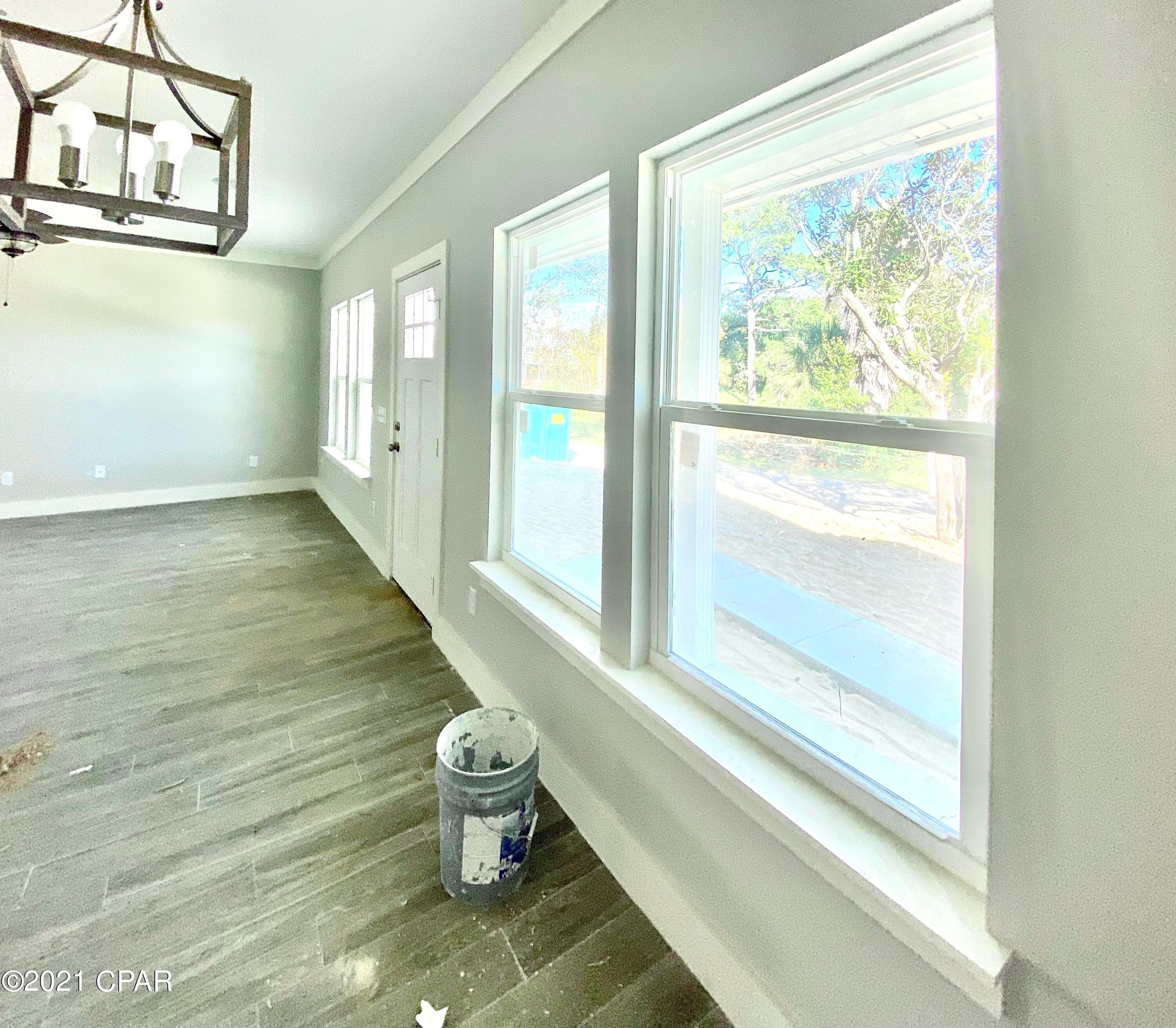 CURRENTLY UNDER CONTRACT, SELLER ACCEPTING BACKUP OFFERS. WEST END!! LAGUNA BEACH!! NEW CONSTRUCTION!! VERY CLOSE PROXIMITY TO THE BEACH!! Gorgeous, brand new beach home in the highly sought after area of Laguna Beach! This home not only has 3 bedrooms, but it also has 3 FULL BATHROOMS! The coveted DEDICATED BEACHES are a quick golf cart ride away. There is nothing else like it on the market! This adorable beach house will make a perfect first home, second home, or lucrative investment with the potential to bring in at least $60K/year. This is a LARGE LOT and the home is placed with the intention of leaving PLENTY OF ROOM TO ADD A POOL, raising the rental potential even more! Beach Access 84 is a 1 minute ride, or 4 minute walk away, and there is plenty of room to park your golf cart or bicycles. Home is very close to completion.  It features beautiful, beachy, neutral colors throughout, like Sherwin Williams Sea Salt and Agreeable Gray. Inside you will find tile plank flooring throughout the entire home, white quartz countertops, wood cabinets, stainless steel appliances, shiplap accent walls in the living area and master bedroom, and more! The exterior construction includes upgrades such as a metal roof, upgraded roof insulation to make the home energy efficient, hardie board siding, irrigation system, and lots of storage, including an owners closet inside, and another huge closet in the garage which can be used for an additional owners closet, or just for extra storage. Privacy fence and sod are scheduled and currently being installed. And there's an outdoor shower to rinse off after your days at the beach! You are located right in the middle of the popular 30A area and Pier Park. Your choice of shops, restaurants and entertainment are less than 10 minutes away in both directions! So much to do and enjoy in this growing area! Northwest Florida International Airport is less than 25 minutes away. Ranked #2 "Emerging Destination" in the world by Tripadvisor's Travelers Choice 2021.  Don't miss this opportunity! *All information is approximate and should be verified by buyer if important.