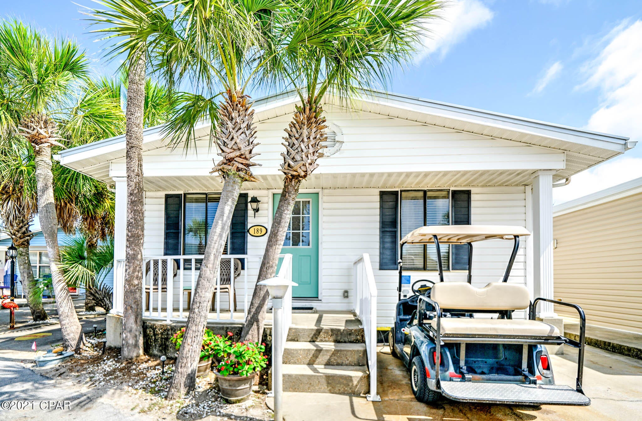 The wait is over, you found your new beach house! Check out this darling 3 bedroom 2 bath Venture Out home.  This stunning home has large rooms and flows beautifully.  The location is fantastic within the resort.    Great potential here for investment or 2nd home!  Venture Out is a golf cart community that has exploded with popularity recently... With 300' on the beautiful pristine beaches of the Gulf of Mexico and 1,000' on the Grand Lagoon. Venture Out has something for everyone. With 2 pools, fishing pier, boat ramp, mini golf, children's play ground and much much more!