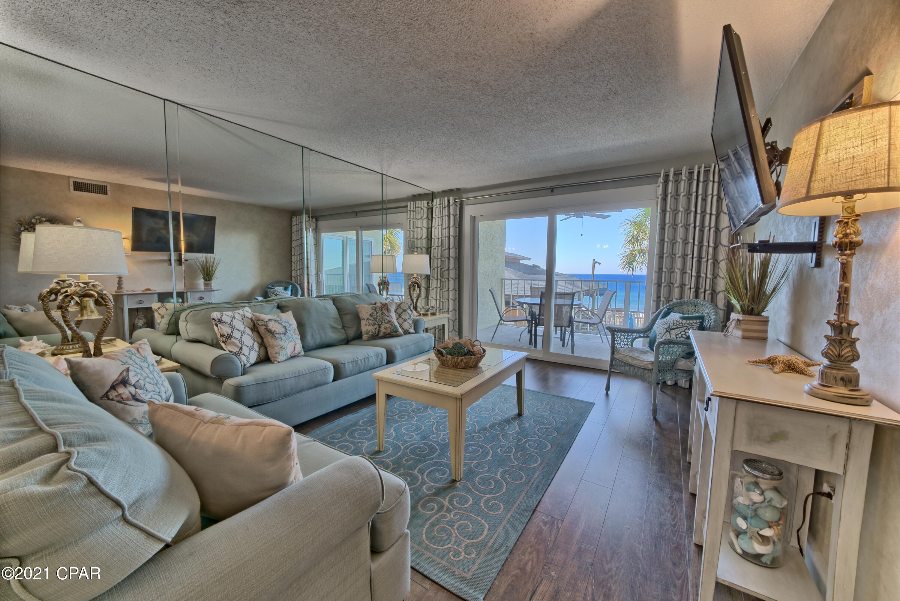 ***ABSOLUTE MUST SEE**** This 2 bed 2 bath condo with a GULF FRONT MASTER SUITE is being sold FULLY FURNISHED and RENTAL READY!!!. This FANTASTIC floor plan sleeps 6 comfortably and is LOCATED on the HIGHLY DESIRABLE 2nd floor which eliminates long elevator wait times.  The condo has been recently RENOVATED with LUXURY VINYL PLANK FLOORING, new sliding doors and windows, new washer/dryer and is BEAUTIFULLY FURNISHED!!. REGENCY TOWERS is a PREMIER PANAMA CITY BEACH RESORT which offers 2 gulf front pools, Jacuzzi Hot Tub, TIKI HUT bar & grill, fitness facility, BBQ Grills and the list goes on and on. The PREMIER LOCATION is just minutes to St. Andrews State Park, marinas, fine dining, shopping and the BEST PCB has to offer. Don't let this once in a lifetime opportunity pass you by!!!