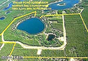 BREAM POND 1.58 ACRE LOT-OWNER FINANCING AVAILABLE-20% DOWN/20 YEAR AMORTIZATION/9%INTEREST/5 YEAR BALLOON-ATTENTION BUILDERS AND DEVELOPERS- This is a Dream Property ready to BUILD-OUT.  40 separate parcels in a complete subdivision surrounding and including Bream Pond in Northern Bay County.  All Platted, Paved Roads, Underground Electric.  With all of the recent Growth in the Sand Hills portion of Northern Bay County, this property is ready-to-go.  This property is about ½ mile East of Hwy77 and is ½ mile South of Hwy 20 making it a very convenient location.  Bream Pond is a beautiful approximately 30 Acre Lake that is known for its fishing.  It has clean clear water and a white sand lake bottom making it a desirable lake for swimming, kayaking, and other water activities.