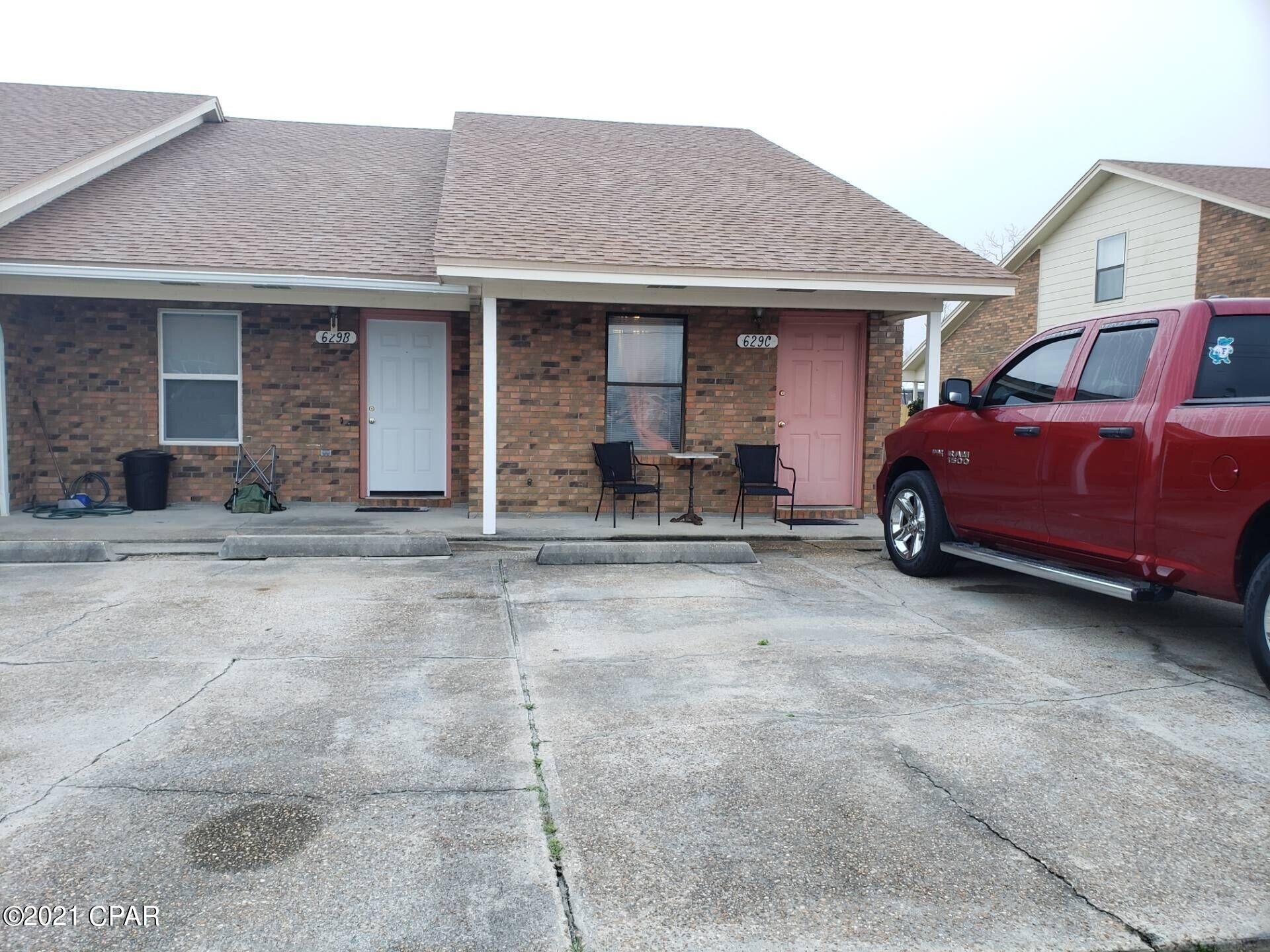 This is a 2 bedroom 2 full bath townhouse with vaulted ceilings. There's a patio door to the back yard in the bottom bedroom. There's also an outside washer dryer area closet this townhouse is spacious it has a very large living room and bedrooms. Upstairs bedroom has a walk in closet. Trash and yard service included.