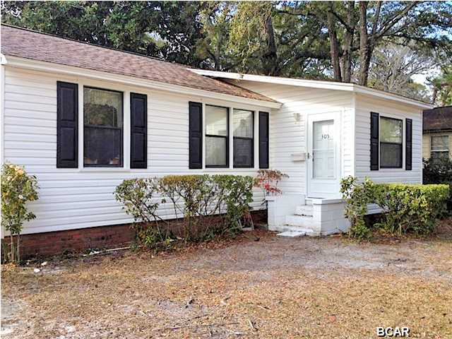 This is a very nice home situated on a large, shady, convenient lot in highly desirable Cove area! Just south of First Methodist church, and near shopping, hospital and schools. Newly refinished hardwood floors, original door knobs, has been in one family since the 40's, and well-maintained. Four bedrooms, one joining the Master, which would be ideal for an office, nursery, or sewing room, etc...The living/dining room is large, and there is a large kitchen/den area as well, on the rear of the home, convenient to the large patio and separate (triple) garage and utility storage/workshop area. There is a shallow well and small additional storage building in the spacious rear yard. This home is ready for a family to truly enjoy outdoor living, yet enjoy the convenience to town, churches,