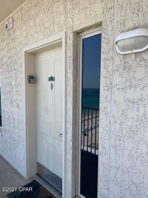 CURRENTLY UNDER CONTRACT. SELLER IS ACCEPTING BACKUP OFFERS. This gorgeous unit has been renovated top to bottom.  The balcony has been recently painted and furnished with lots of new seating for you to sit and enjoy the view. This floorpan has a balcony that faces directly west for you to have the BEST VIEW of the AMAZING SUNSETS over the Gulf of Mexico! It also comes with a DEEDED PARKING SPOT. This unit boasts new flooring throughout the ENTIRE unit. No old tile in kitchen, baths or entry, or carpet in the bedroom like most units. Owners spared no expensive removing all old flooring and replacing it with high end vinyl plank flooring to create a lovely flow that you won't see in other units. It makes such a difference! You will see new wall and ceiling paint throughout as well as new decor and new furnishing, all in todays most popular colors &design.  New living, dining, and bedroom furniture, new linens, new water heater, dehumidifier, washer/dryer, thermostat, decor, and more!  This unit is immaculate and a must see!! Enjoy the many amenities the beautiful Panama Resort has to offer - Resort pools, indoor pool and sauna, exercise room, and in location close to restaurants, shops and activities.  *All information is approximate and should be verified by buyer if important.