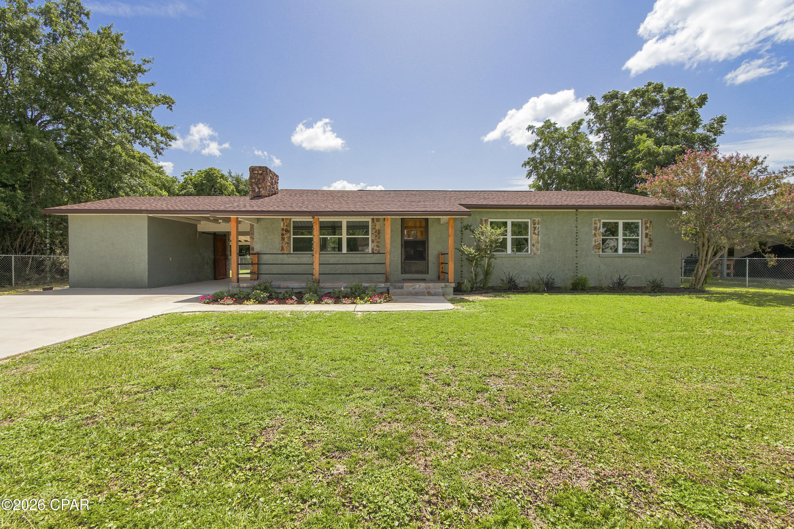 Cute. Updated. Move-in ready. Centrally located. This is a great house!

Lovingly cared for by its original owner, this home was charming from the start--but its current owner just completed a top-to-bottom remodel which took it to the next level!  Welcome to this adorable 3-bedroom, 2-bath home just off Baldwin Road, where modern updates meet everyday comfort in one of Panama City's most convenient locations.

From the brand-new oversized driveway and fresh landscaping to the covered parking and inviting curb appeal, this home makes a great first impression--and it only gets better inside. The functional floor plan offers approximately 1,600 square feet of comfortable living space, perfect for everything from quiet evenings at home to entertaining family and friends.

The beautifully updated kitchen features brand-new stainless steel appliances, quartz countertops, a subway tile backsplash, freshly painted wood cabinets, and a freestanding pantry that adds both charm and functionality.

Both bathrooms have been thoughtfully refreshed. The hall bath boasts a new double vanity and updated lighting, while the private primary suite features a beautifully renovated bathroom with a new shower and updated fixtures.

One of the home's most valuable improvements is one you can't always see--the entire home has been completely rewired--providing added peace of mind for years to come. Several new light fixtures complete the fresh, updated feel.

Step outside and you'll find an attached carport, a covered back porch perfect for morning coffee or evening cookouts, and a fully fenced backyard with plenty of room for pets, play, gardening, or simply relaxing.

Best of all? No HOA. No restrictions. Just a beautifully updated home in a fantastic central location that makes getting anywhere in Panama City quick and easy.

Stop thinking and start packing! This one checks all the boxes!