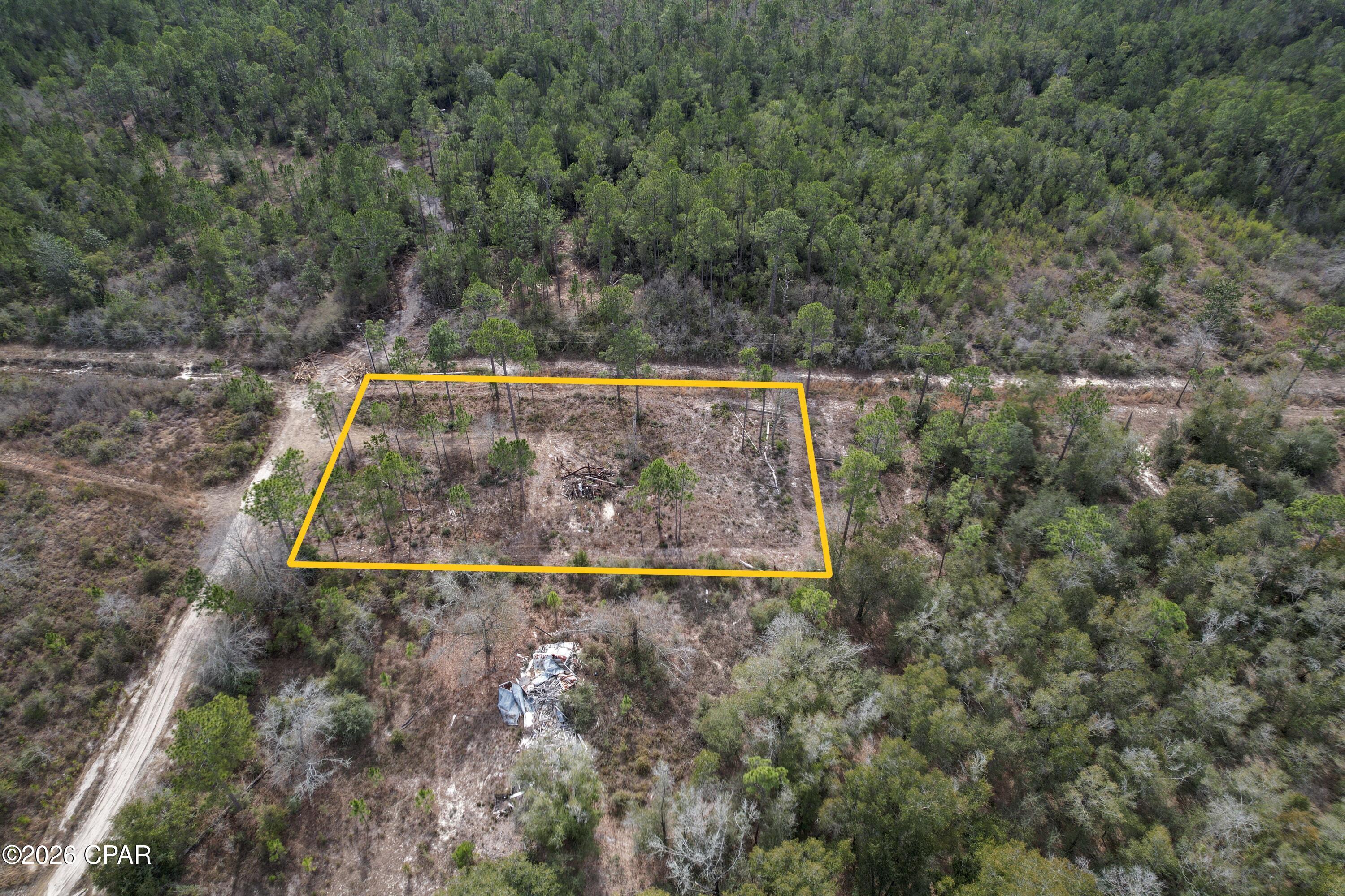 Build with confidence on this fully cleared 1-acre homesite in Fountain, FL. The groundwork is already done: septic, water, and electricity are in place, saving you time and upfront expense.

With no HOA,  restrictions, or additional fees, you have the flexibility to create the property that fits your vision. Conveniently located just two roads east of Highway 231 North, you'll enjoy easy access while still having the space and freedom that makes country living appealing.